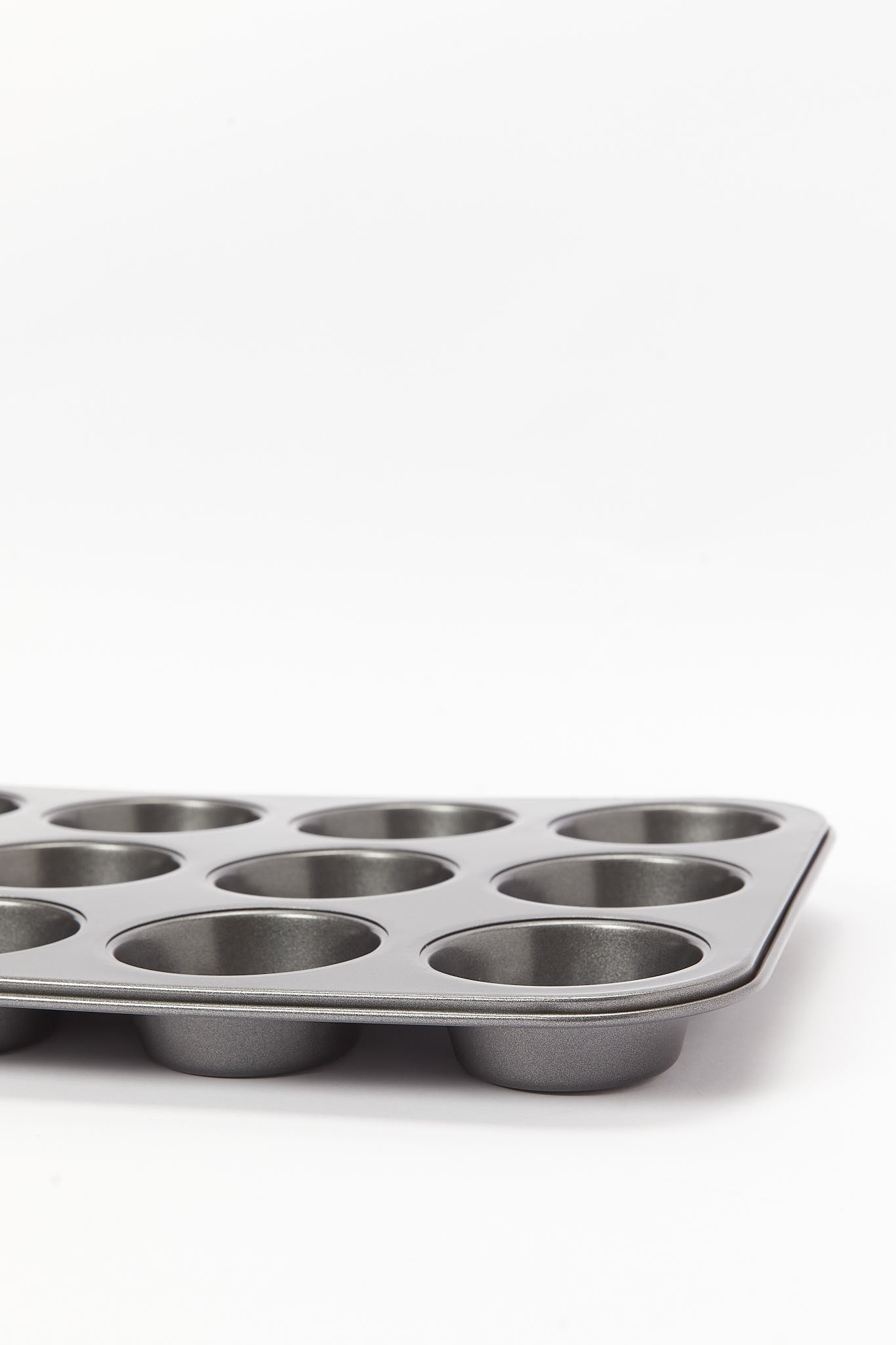 Redtag-Grey-12Cups-Muffin-Pan-Category:Bakeware,-Colour:Grey,-Deals:New-In,-Dept:Home,-Filter:Home-Dining,-HMW-DIN-Cookware,-New-In-HMW-DIN,-Non-Sale,-S23B,-Section:Homewares-Home-Dining-