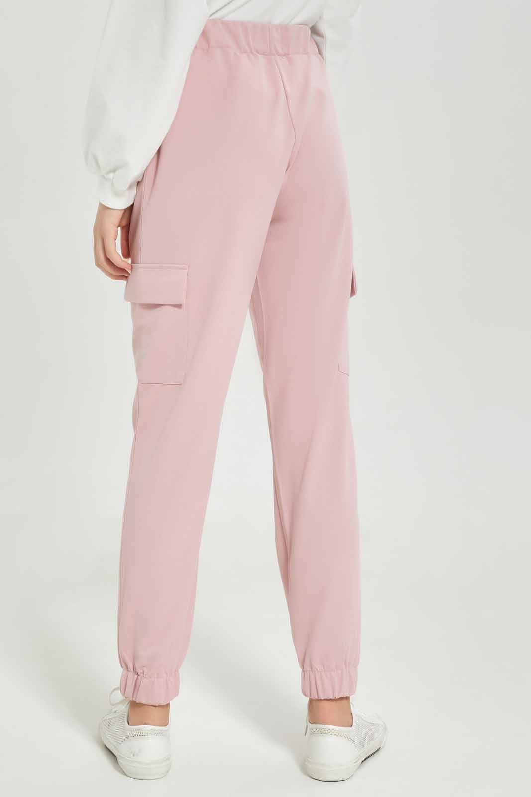 Redtag-Girls-Pink-Cargo-Pocket-Knitted-Jogger-Category:Trousers,-Colour:Apricot,-Deals:New-In,-Dept:Girls,-Filter:Senior-Girls-(8-to-14-Yrs),-GSR-Trousers,-New-In-GSR-APL,-Non-Sale,-S23A,-Section:Girls-(0-to-14Yrs),-VLM-Senior-Girls-9 to 14 Years