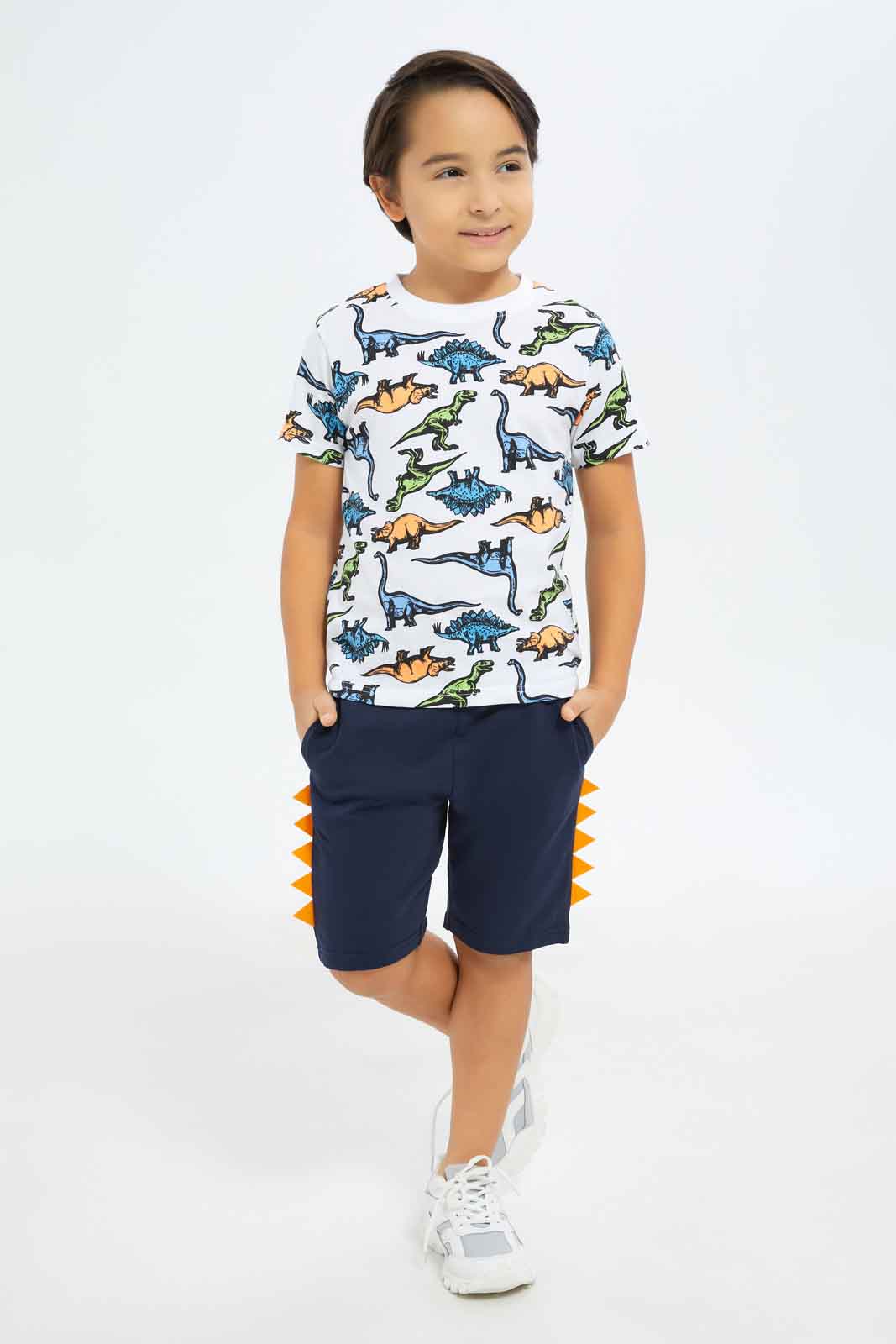 Redtag-Boys-White-Dino-Aop-T-Shirt-With-Terry-Bottom-BOY-Sets,-Category:Sets,-Colour:White,-Deals:New-In,-Dept:Boys,-Filter:Boys-(2-to-8-Yrs),-New-In-BOY-APL,-Non-Sale,-S23A,-Section:Boys-(0-to-14Yrs)-Boys-2 to 8 Years