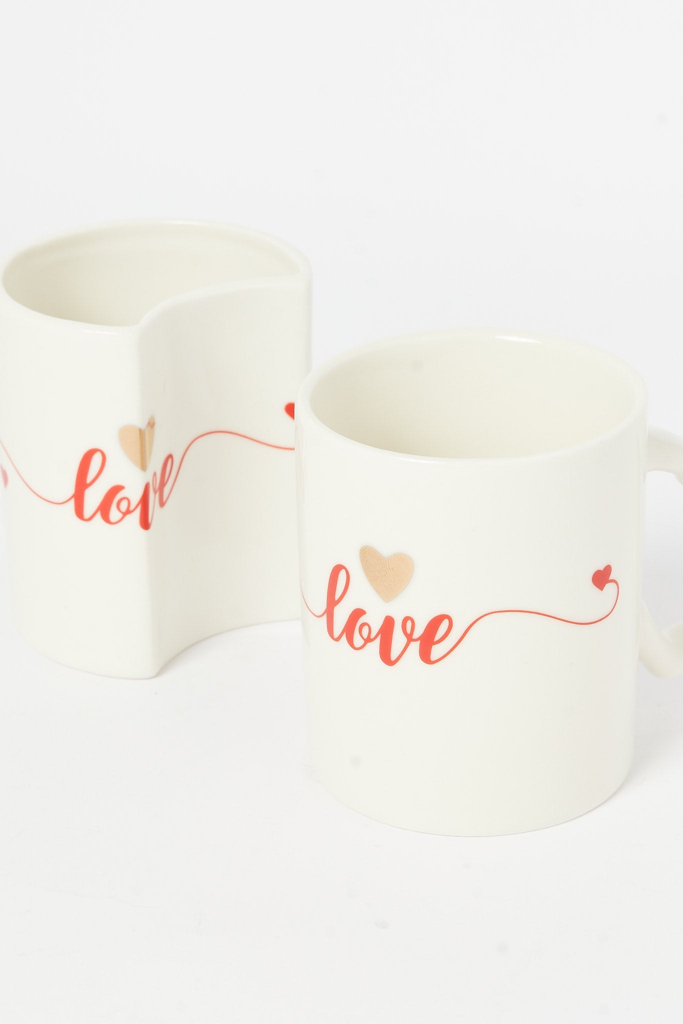 Redtag-White-Heart-Shape-Mug-(2-Piece)-Category:Cups-&-Mugs,-Colour:White,-Deals:New-In,-Dept:Home,-Filter:Home-Dining,-H1:HMW,-H2:DIN,-H3:CRC,-H4:CCS,-HMW-DIN-Crockery,-New-In-HMW-DIN,-Non-Sale,-S23A,-Season:S23A,-Section:Homewares-Home-Dining-
