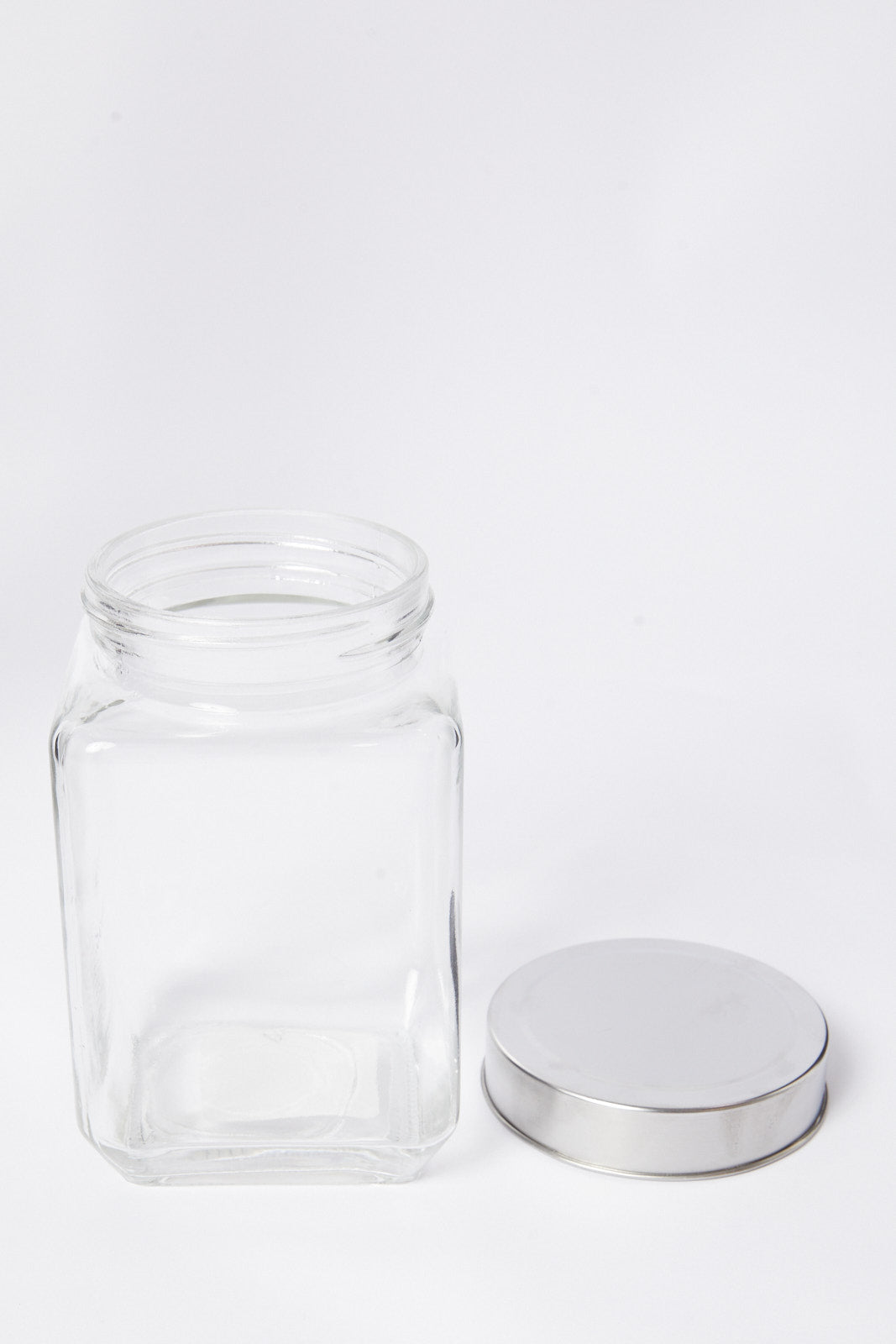 Redtag-Clear-Glass-Storage-Jar-(Medium)-Category:Canisters-And-Jars,-Colour:White,-Deals:New-In,-Dept:Home,-Filter:Home-Dining,-HMW-DIN-Storage,-New-In-HMW-DIN,-Non-Sale,-S23A,-Section:Homewares-Home-Dining-