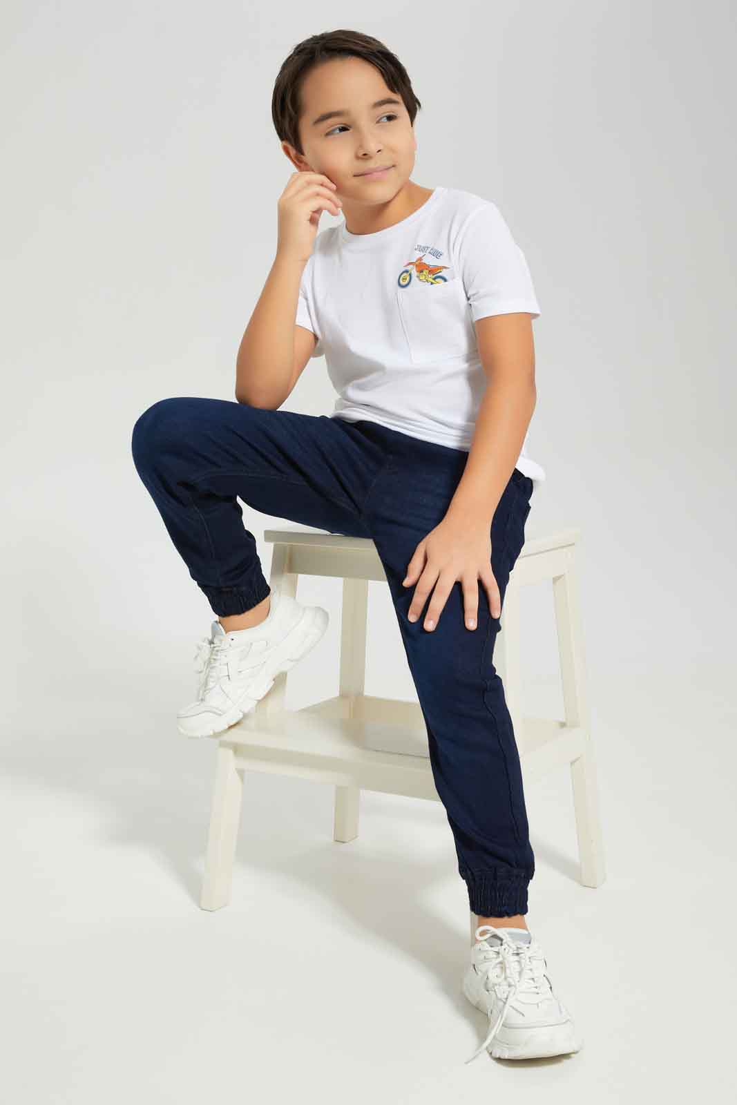 Redtag-Boys-White-Ride-Print-Pocket-Short-Sleeve-T-Shirt-BOY-T-Shirts,-Category:T-Shirts,-Colour:White,-Deals:New-In,-Dept:Boys,-Filter:Boys-(2-to-8-Yrs),-New-In-BOY-APL,-Non-Sale,-S23A,-Section:Boys-(0-to-14Yrs),-TBL-Boys-2 to 8 Years