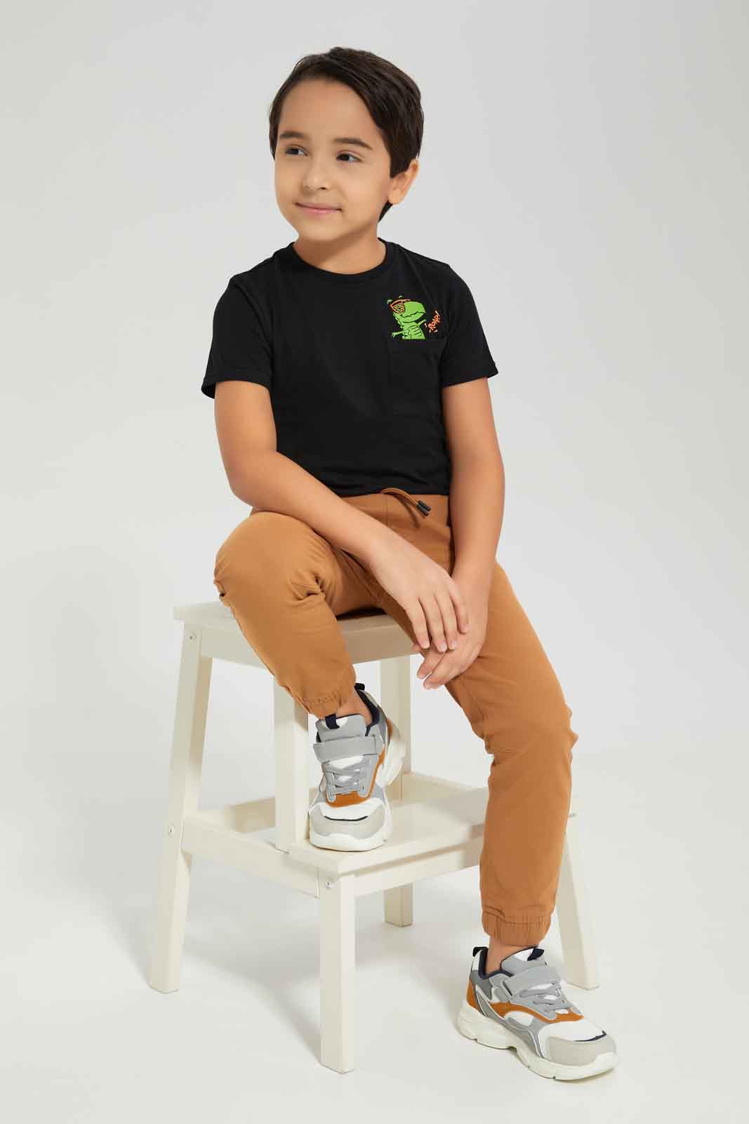 Redtag-Boys-Black-Roar-Print-Pocket-Short-Sleeve-T-Shirt-BOY-T-Shirts,-Category:T-Shirts,-Colour:Black,-Deals:New-In,-Dept:Boys,-Filter:Boys-(2-to-8-Yrs),-New-In-BOY-APL,-Non-Sale,-S23A,-Section:Boys-(0-to-14Yrs),-TBL-Boys-2 to 8 Years