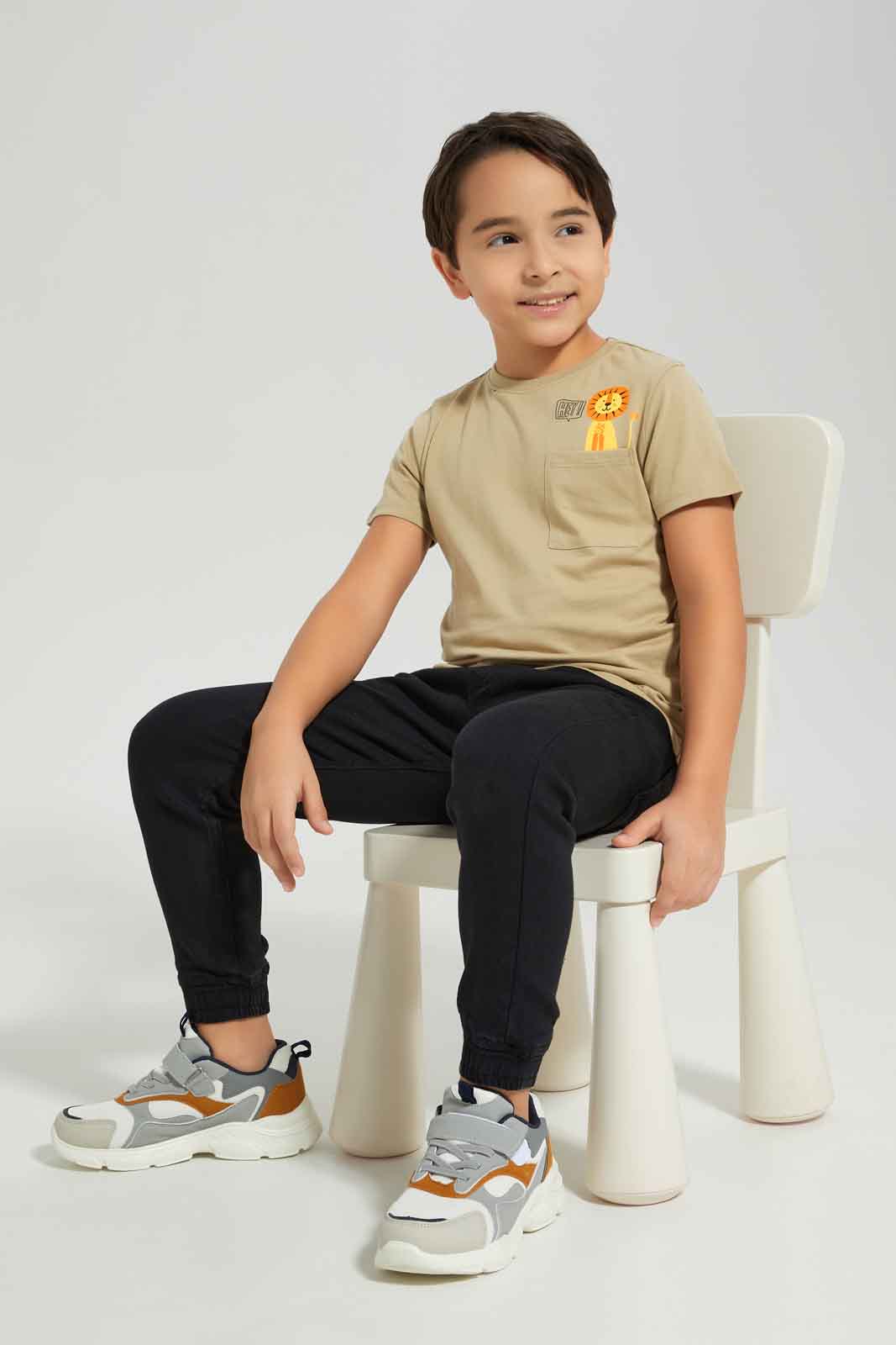 Redtag-Boys-Stone-Lion-Print-Pocket-Short-Sleeve-T-Shirt-BOY-T-Shirts,-Category:T-Shirts,-Colour:Beige,-Deals:New-In,-Dept:Boys,-Filter:Boys-(2-to-8-Yrs),-New-In-BOY-APL,-Non-Sale,-S23A,-Section:Boys-(0-to-14Yrs),-TBL-Boys-2 to 8 Years