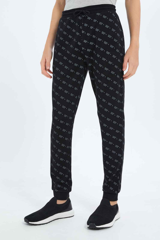 Redtag-Boys-Black-Aop-Active-Pants-BSR-Joggers,-Category:Joggers,-Colour:Black,-Deals:New-In,-Dept:Boys,-Filter:Senior-Boys-(8-to-14-Yrs),-New-In-BSR-APL,-Non-Sale,-S23B,-Section:Boys-(0-to-14Yrs)-Senior-Boys-9 to 14 Years