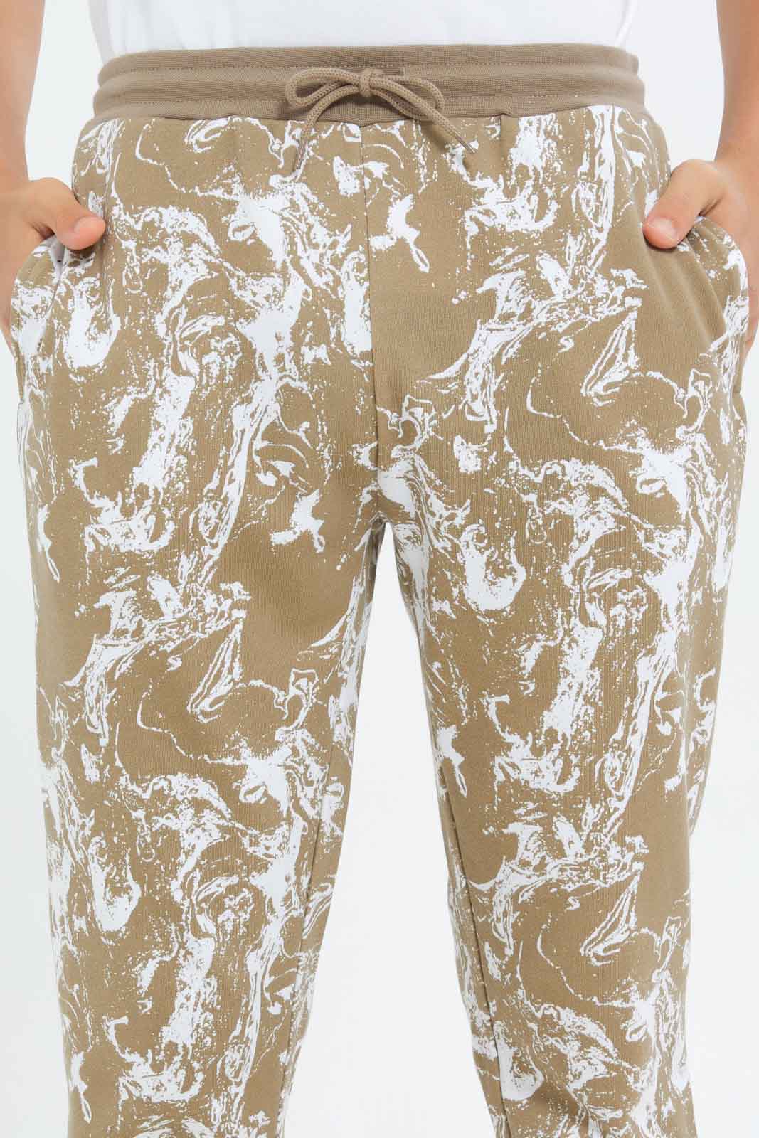 Redtag-Boys-Beige-Marble-Print-Active-Pants-BSR-Joggers,-Category:Joggers,-Colour:Beige,-Deals:New-In,-Dept:Boys,-Filter:Senior-Boys-(8-to-14-Yrs),-New-In-BSR-APL,-Non-Sale,-S23B,-Section:Boys-(0-to-14Yrs)-Senior-Boys-9 to 14 Years