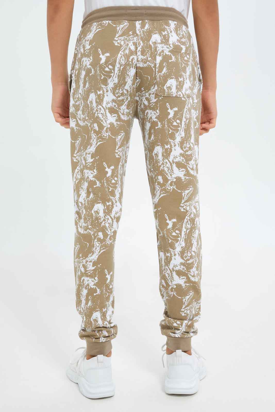 Redtag-Boys-Beige-Marble-Print-Active-Pants-BSR-Joggers,-Category:Joggers,-Colour:Beige,-Deals:New-In,-Dept:Boys,-Filter:Senior-Boys-(8-to-14-Yrs),-New-In-BSR-APL,-Non-Sale,-S23B,-Section:Boys-(0-to-14Yrs)-Senior-Boys-9 to 14 Years