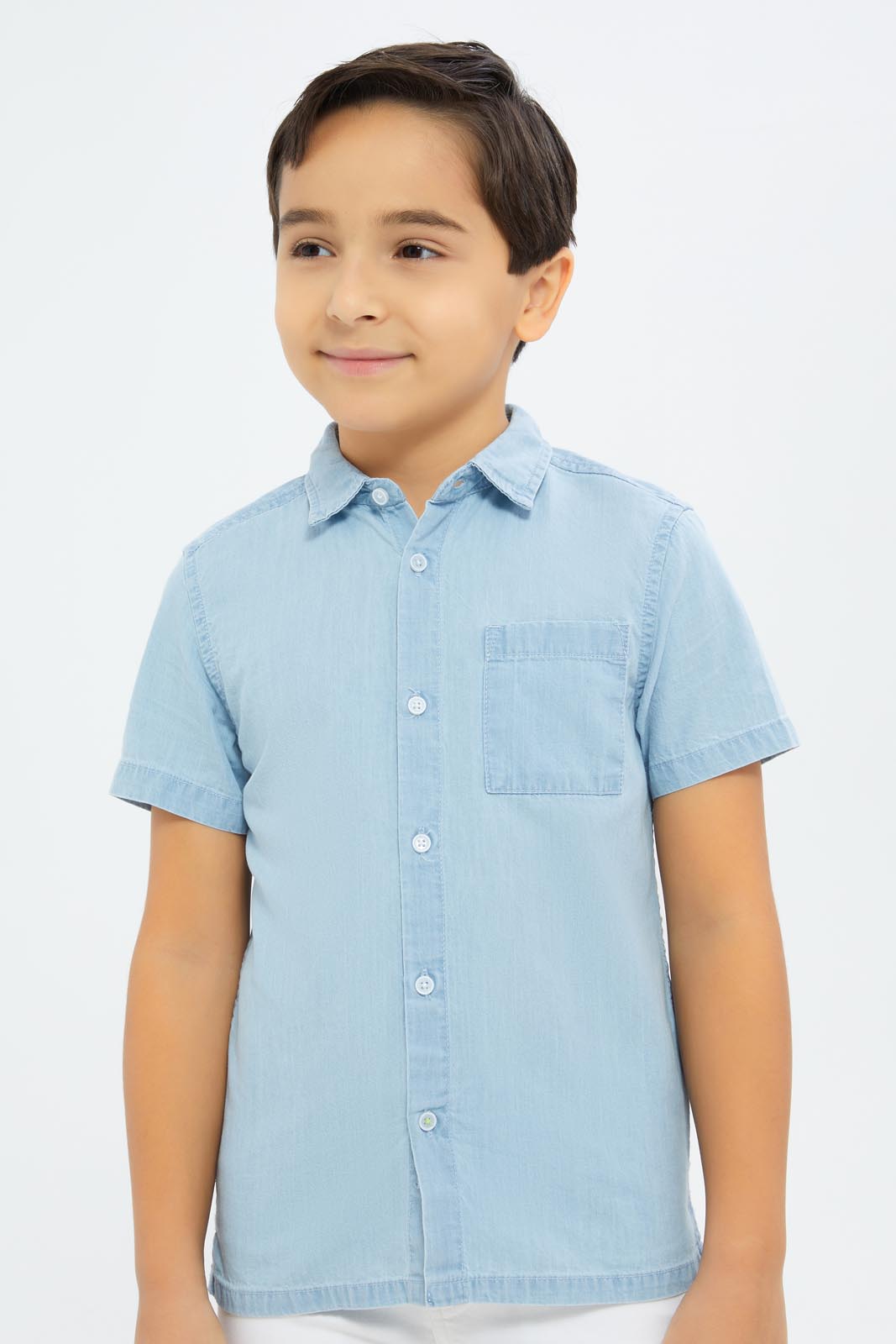 Redtag-Boys-Light-Blue-Short-Sleeve-Denim-Shirt-BOY-Shirts,-Category:Shirts,-Colour:Blue,-Deals:2-FOR-89,-Deals:New-In,-Dept:Boys,-Filter:Boys-(2-to-8-Yrs),-New-In-BOY-APL,-Non-Sale,-S23B,-Section:Boys-(0-to-14Yrs)-Boys-2 to 8 Years