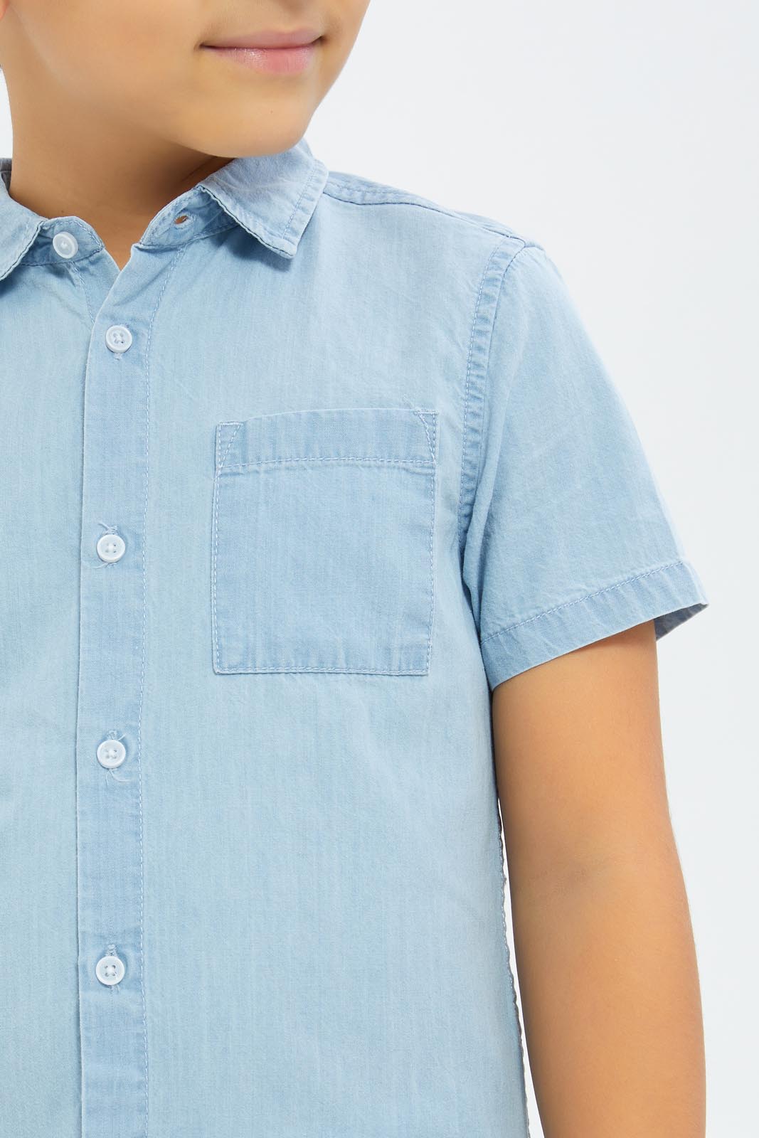 Redtag-Boys-Light-Blue-Short-Sleeve-Denim-Shirt-BOY-Shirts,-Category:Shirts,-Colour:Blue,-Deals:2-FOR-89,-Deals:New-In,-Dept:Boys,-Filter:Boys-(2-to-8-Yrs),-New-In-BOY-APL,-Non-Sale,-S23B,-Section:Boys-(0-to-14Yrs)-Boys-2 to 8 Years