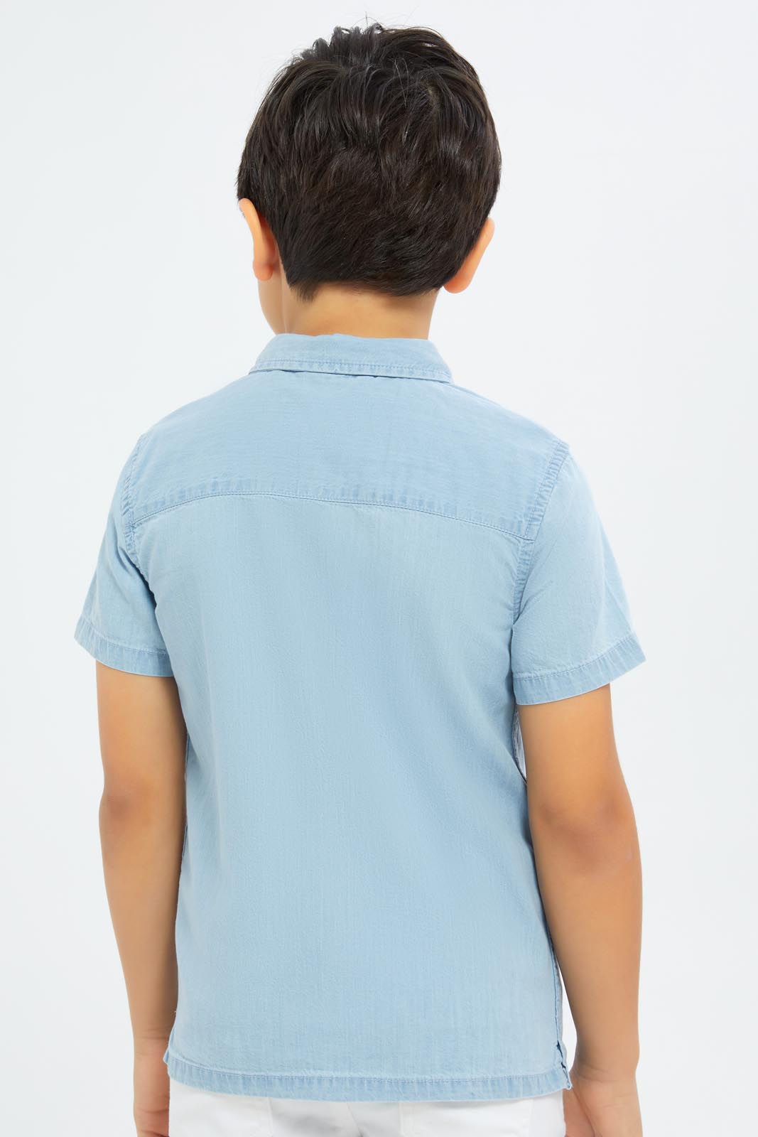 Redtag-Boys-Light-Blue-Short-Sleeve-Denim-Shirt-BOY-Shirts,-Category:Shirts,-Colour:Blue,-Deals:2-FOR-89,-Deals:New-In,-Dept:Boys,-Filter:Boys-(2-to-8-Yrs),-New-In-BOY-APL,-Non-Sale,-S23B,-Section:Boys-(0-to-14Yrs)-Boys-2 to 8 Years