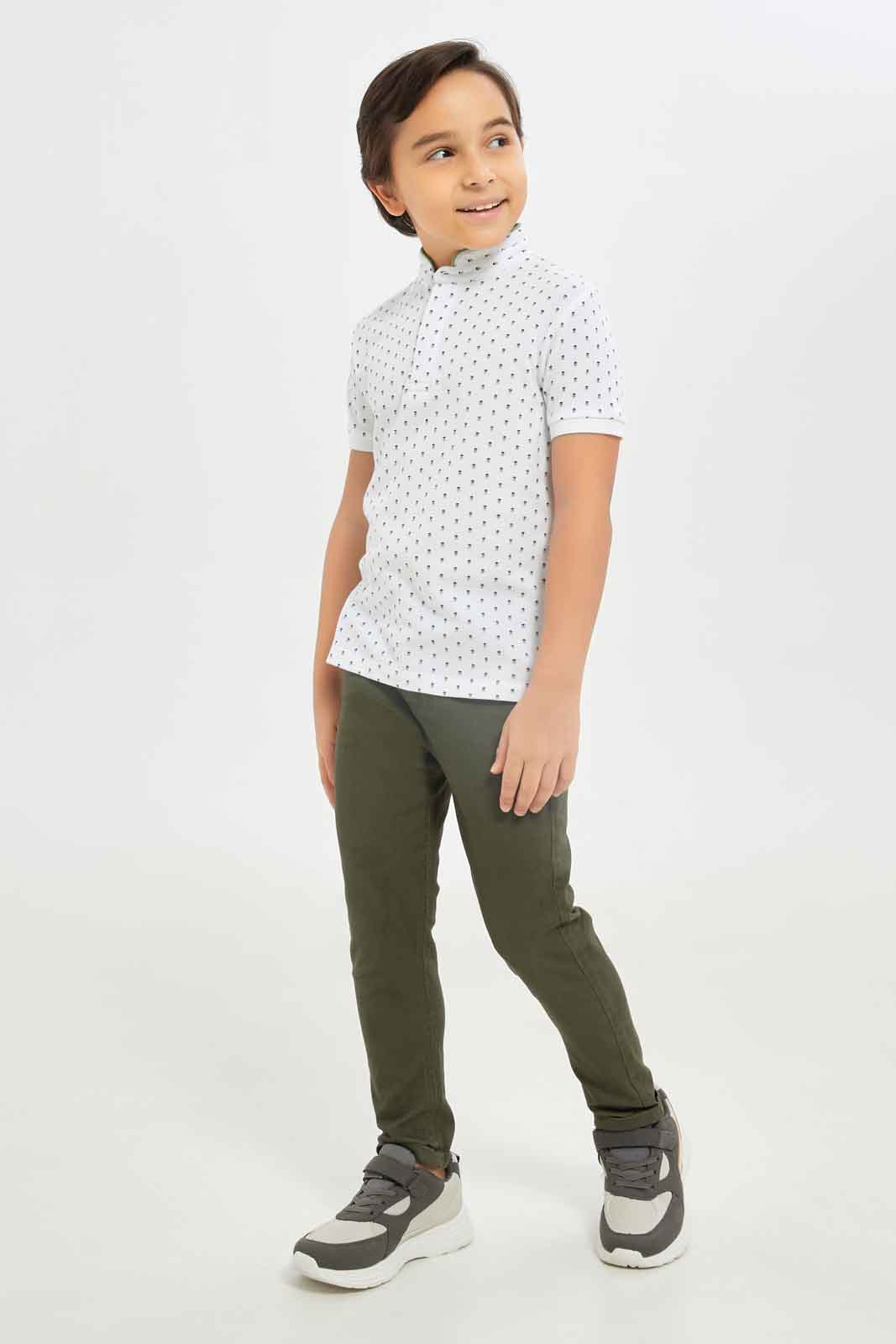 Redtag-Boys-White-Aop-Stand-Up-Collar-Polo-T-Shirt-BOY-Polo-T-Shirts,-Category:Polo-T-Shirts,-Colour:White,-Deals:New-In,-Dept:Boys,-Filter:Boys-(2-to-8-Yrs),-New-In-BOY-APL,-Non-Sale,-S23B,-Section:Boys-(0-to-14Yrs),-TBL-Boys-2 to 8 Years