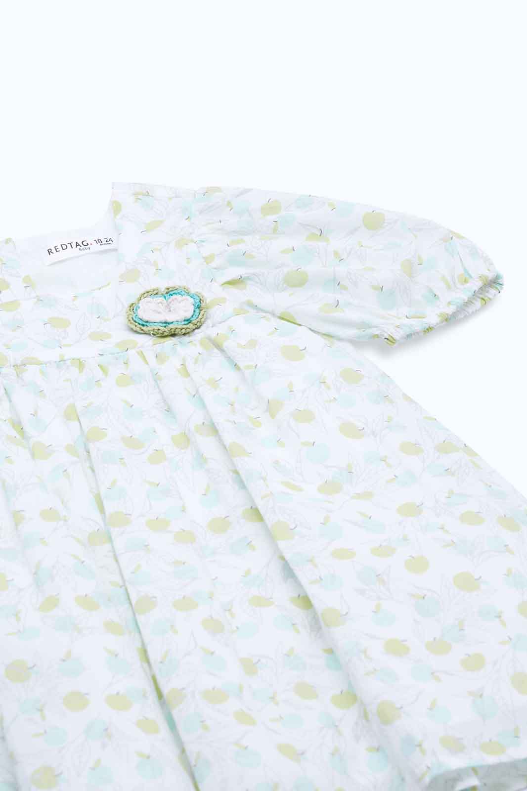 Redtag-Girls-White-Apple-Aop-Dress-Category:Dresses,-Colour:White,-Deals:New-In,-Dept:Girls,-Filter:Infant-Girls-(3-to-24-Mths),-ING-Dresses,-New-In-ING-APL,-Non-Sale,-S23B,-Section:Girls-(0-to-14Yrs)-Infant-Girls-3 to 24 Months