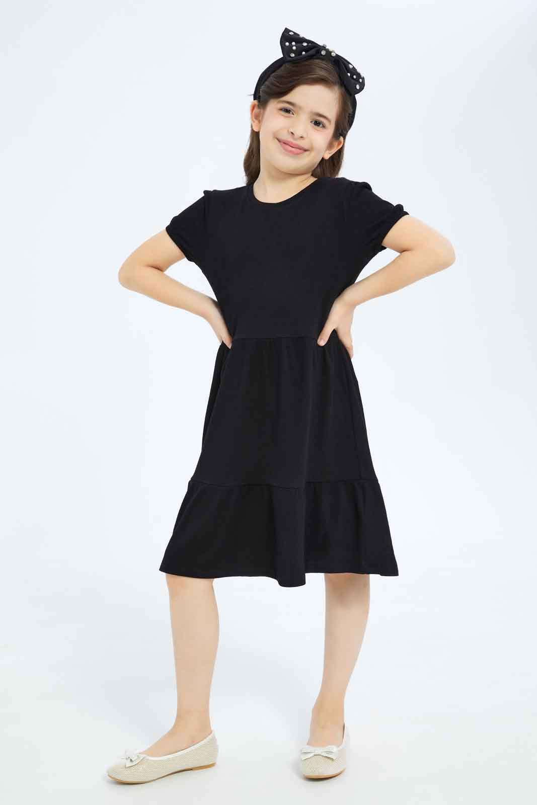 Redtag-Girls-Textured-Knit-Trapeze-Dress---Black-Category:Dresses,-Colour:Black,-Deals:New-In,-Dept:Girls,-Filter:Girls-(2-to-8-Yrs),-GIR-Dresses,-New-In-GIR-APL,-Non-Sale,-S23B,-Section:Girls-(0-to-14Yrs)-Girls-2 to 8 Years