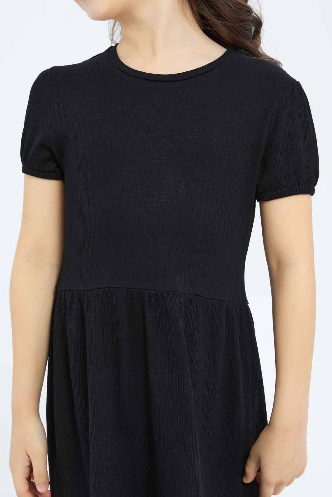 Redtag-Girls-Textured-Knit-Trapeze-Dress---Black-Category:Dresses,-Colour:Black,-Deals:New-In,-Dept:Girls,-Filter:Girls-(2-to-8-Yrs),-GIR-Dresses,-New-In-GIR-APL,-Non-Sale,-S23B,-Section:Girls-(0-to-14Yrs)-Girls-2 to 8 Years