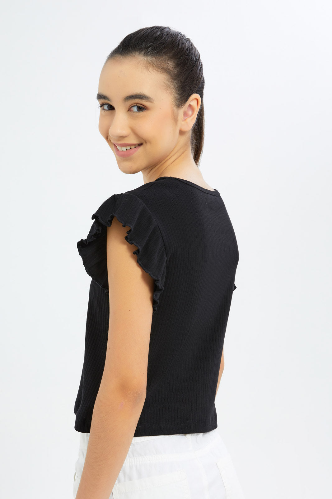 Redtag-Girls-Black-Ruffles-Sleeve-Rib-Top-Category:T-Shirts,-Colour:Black,-Deals:New-In,-Dept:Girls,-Filter:Senior-Girls-(8-to-14-Yrs),-GSR-T-Shirts,-H1:KWR,-H2:GSR,-H3:TSH,-H4:CAT,-New-In-GSR-APL,-Non-Sale,-S23B,-Season:S23B,-Section:Girls-(0-to-14Yrs),-TBL-Senior-Girls-9 to 14 Years