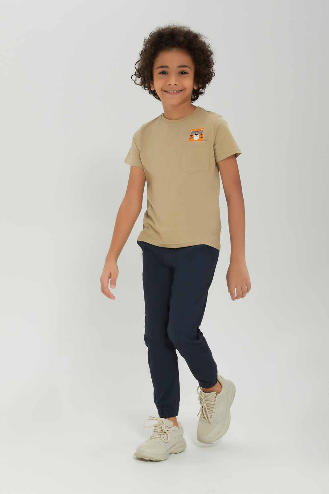 Redtag-Boys-Beige-Lion-Short-Sleeve-Print-Pocket-T-Shirt-BOY-T-Shirts,-Category:T-Shirts,-Colour:Beige,-Deals:New-In,-Dept:Boys,-Filter:Boys-(2-to-8-Yrs),-New-In-BOY-APL,-Non-Sale,-S23B,-Section:Boys-(0-to-14Yrs),-TBL-Boys-2 to 8 Years
