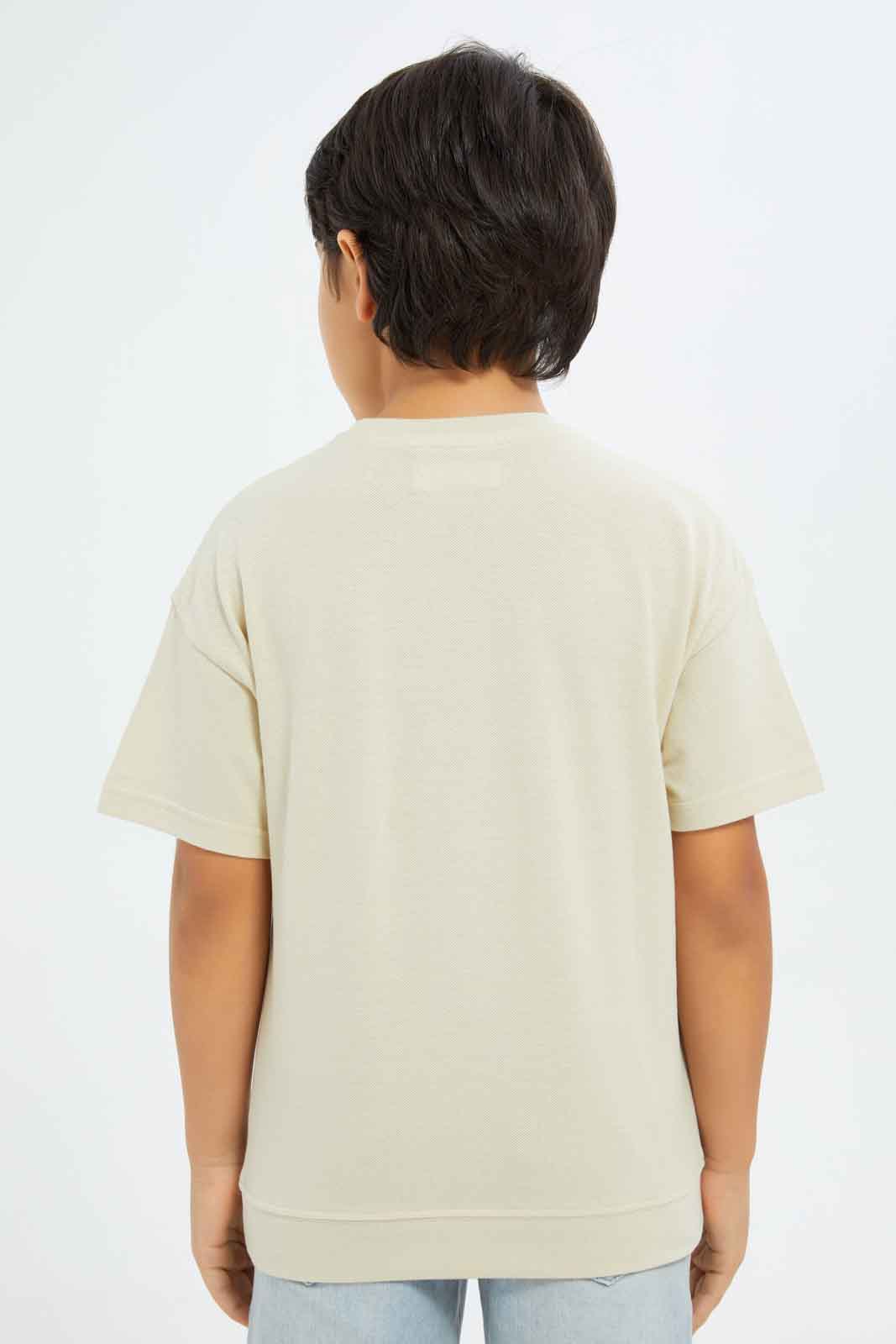 Redtag-Boys-Stone-Embroidered-Short-Sleeve-Oversize-T-Shirt-BOY-T-Shirts,-Category:T-Shirts,-Colour:Beige,-Deals:New-In,-Dept:Boys,-Filter:Boys-(2-to-8-Yrs),-New-In-BOY-APL,-Non-Sale,-S23B,-Section:Boys-(0-to-14Yrs),-TBL-Boys-2 to 8 Years