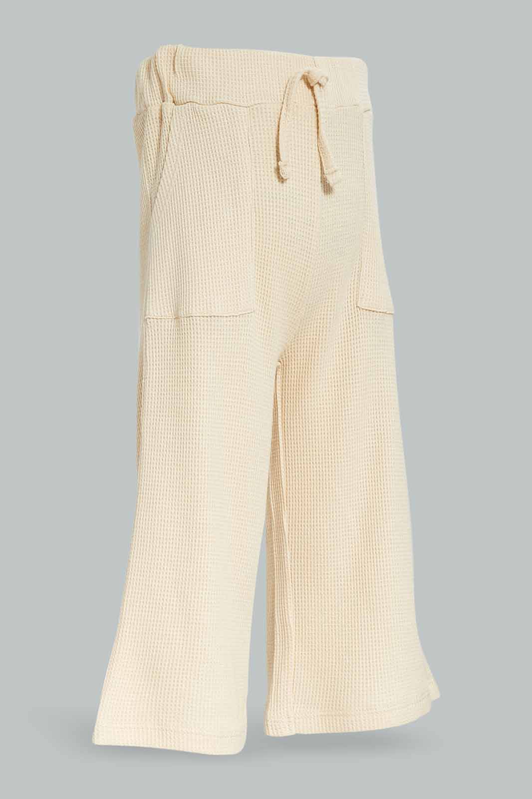 Redtag-Girls-Cream-Wide-Leg-Waffle-Trouser-Category:Trousers,-Colour:Cream,-Deals:New-In,-Dept:Girls,-Filter:Infant-Girls-(3-to-24-Mths),-ING-Trousers,-New-In-ING-APL,-Non-Sale,-S23A,-Section:Girls-(0-to-14Yrs)-Infant-Girls-3 to 24 Months