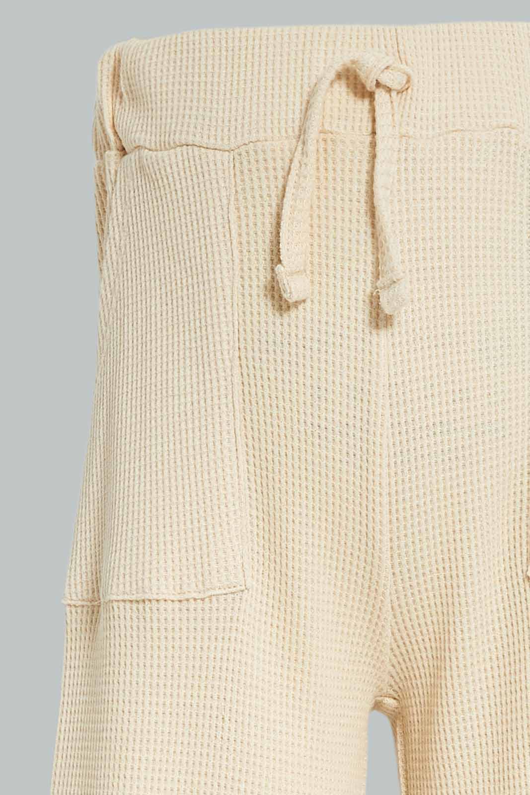 Redtag-Girls-Cream-Wide-Leg-Waffle-Trouser-Category:Trousers,-Colour:Cream,-Deals:New-In,-Dept:Girls,-Filter:Infant-Girls-(3-to-24-Mths),-ING-Trousers,-New-In-ING-APL,-Non-Sale,-S23A,-Section:Girls-(0-to-14Yrs)-Infant-Girls-3 to 24 Months