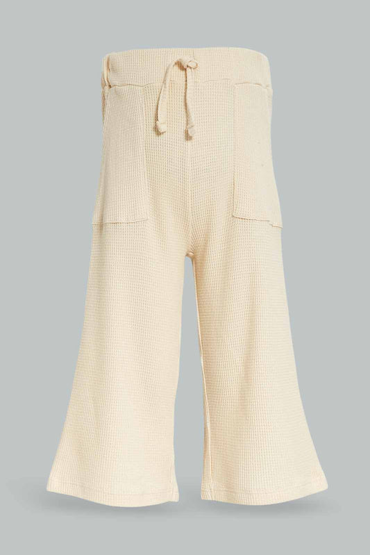 Redtag-Girls-Cream-Wide-Leg-Waffle-Trouser-Category:Trousers,-Colour:Cream,-Deals:New-In,-Dept:Girls,-Filter:Infant-Girls-(3-to-24-Mths),-ING-Trousers,-New-In-ING-APL,-Non-Sale,-S23A,-Section:Girls-(0-to-14Yrs)-Infant-Girls-3 to 24 Months