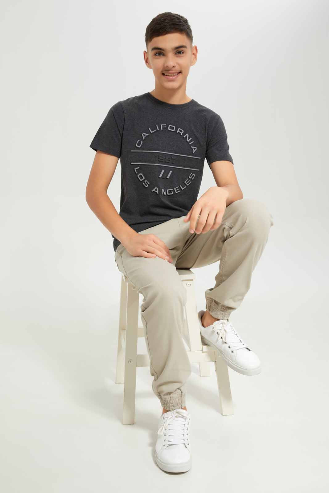 Redtag-Boys-Charcoal-Rubber-Print-Tee-BSR-T-Shirts,-Category:T-Shirts,-Colour:Charcoal,-Deals:New-In,-Dept:Boys,-Filter:Senior-Boys-(8-to-14-Yrs),-New-In-BSR-APL,-Non-Sale,-S23A,-Section:Boys-(0-to-14Yrs)-Senior-Boys-9 to 14 Years