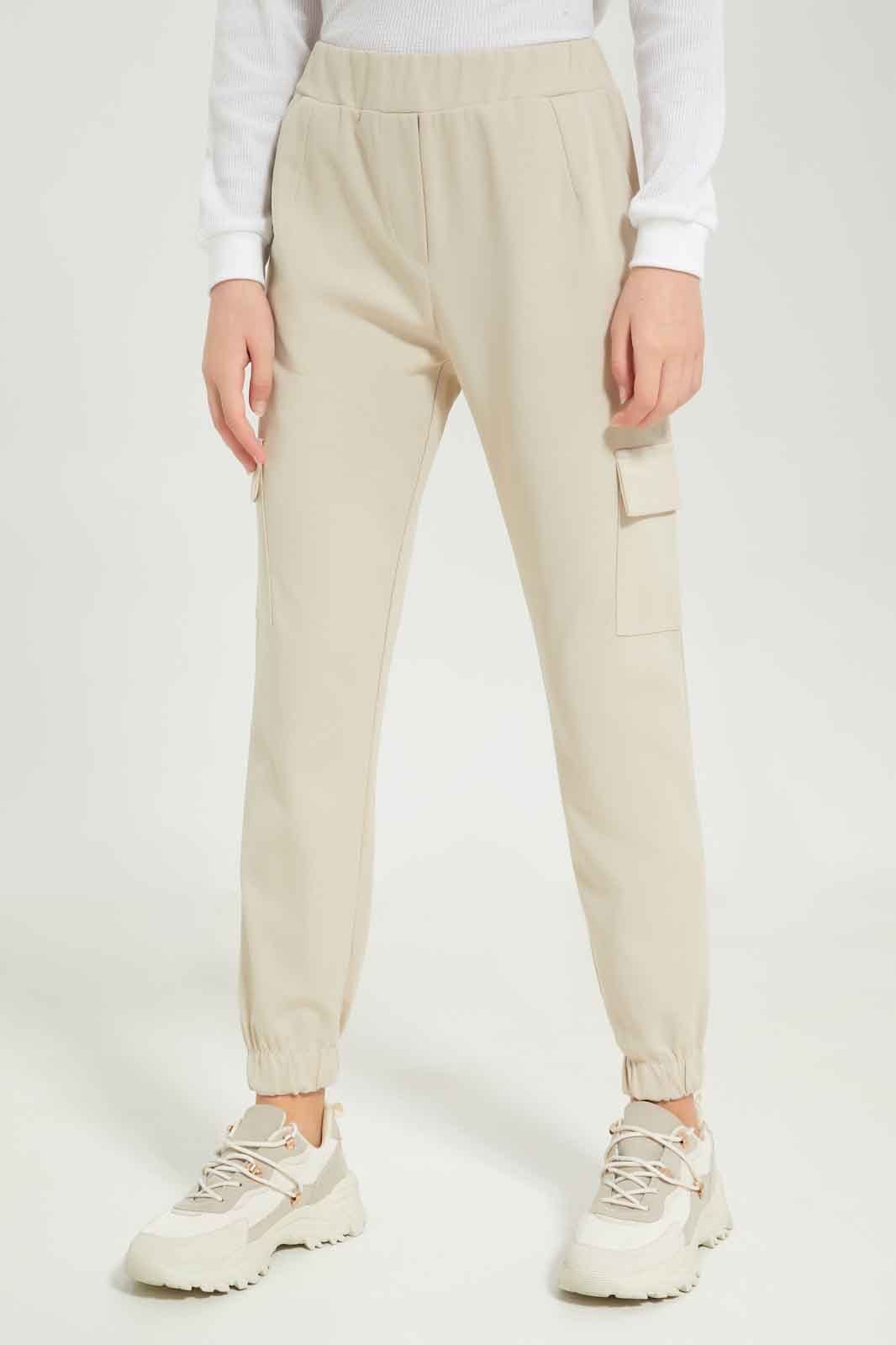 Redtag-Girls-Beige-Cargo-Pocket-Knitted-Jogger-Category:Trousers,-Colour:Beige,-Deals:New-In,-Dept:Girls,-Filter:Senior-Girls-(8-to-14-Yrs),-GSR-Trousers,-New-In-GSR-APL,-Non-Sale,-S23B,-Section:Girls-(0-to-14Yrs),-VLM-Senior-Girls-9 to 14 Years