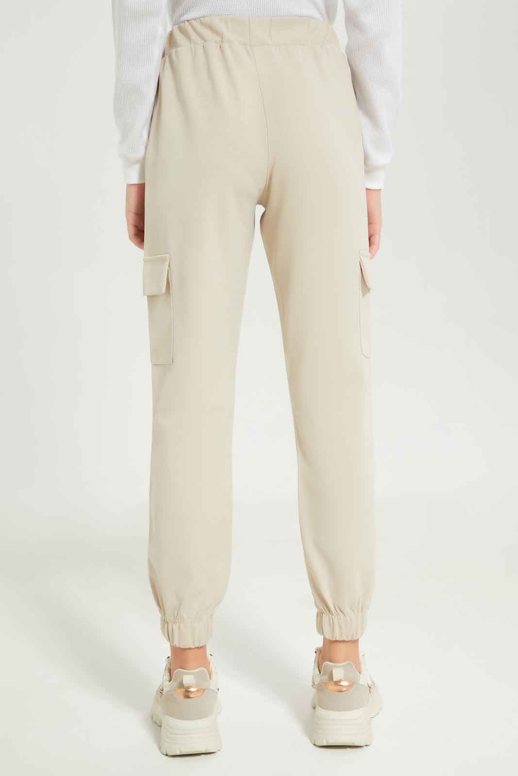 Redtag-Girls-Beige-Cargo-Pocket-Knitted-Jogger-Category:Trousers,-Colour:Beige,-Deals:New-In,-Dept:Girls,-Filter:Senior-Girls-(8-to-14-Yrs),-GSR-Trousers,-New-In-GSR-APL,-Non-Sale,-S23B,-Section:Girls-(0-to-14Yrs),-VLM-Senior-Girls-9 to 14 Years