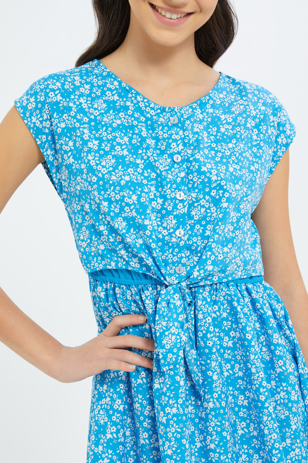 Redtag-Girls-Blue-Floral-Front-Tie-Dress-Category:Dresses,-Colour:Blue,-Deals:New-In,-Dept:Girls,-Filter:Senior-Girls-(8-to-14-Yrs),-GSR-Dresses,-H1:KWR,-H2:GSR,-H3:DRS,-H4:CAD,-New-In-GSR-APL,-Non-Sale,-S23B,-Season:S23B,-Section:Girls-(0-to-14Yrs)-Senior-Girls-9 to 14 Years