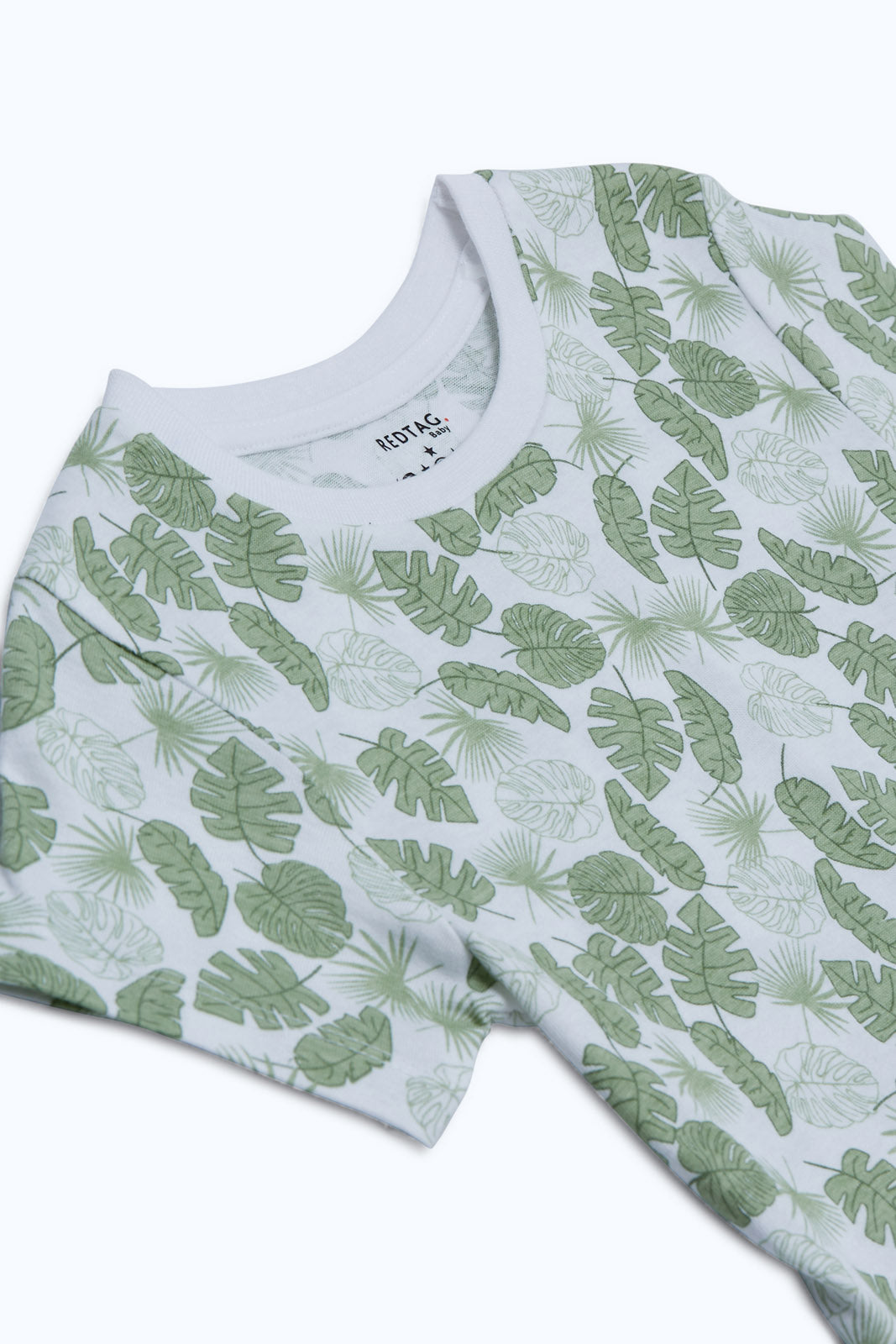 Redtag-Boys-White-Aop-Palm-Tree-Ss-T-Shirt-Category:T-Shirts,-Colour:White,-Deals:New-In,-Dept:Boys,-Filter:Infant-Boys-(3-to-24-Mths),-INB-T-Shirts,-New-In-INB-APL,-Non-Sale,-S23B,-Section:Boys-(0-to-14Yrs),-TBL-Infant-Boys-3 to 24 Months