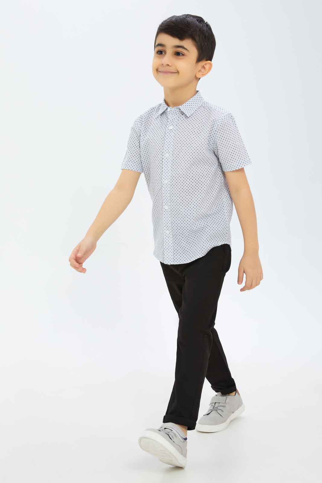 Redtag-Boys-White-Print-Short-Sleeve-Shirt-BOY-Shirts,-Category:Shirts,-Colour:White,-Deals:New-In,-Dept:Boys,-Filter:Boys-(2-to-8-Yrs),-New-In-BOY-APL,-Non-Sale,-S23C,-Section:Boys-(0-to-14Yrs)-Boys-2 to 8 Years