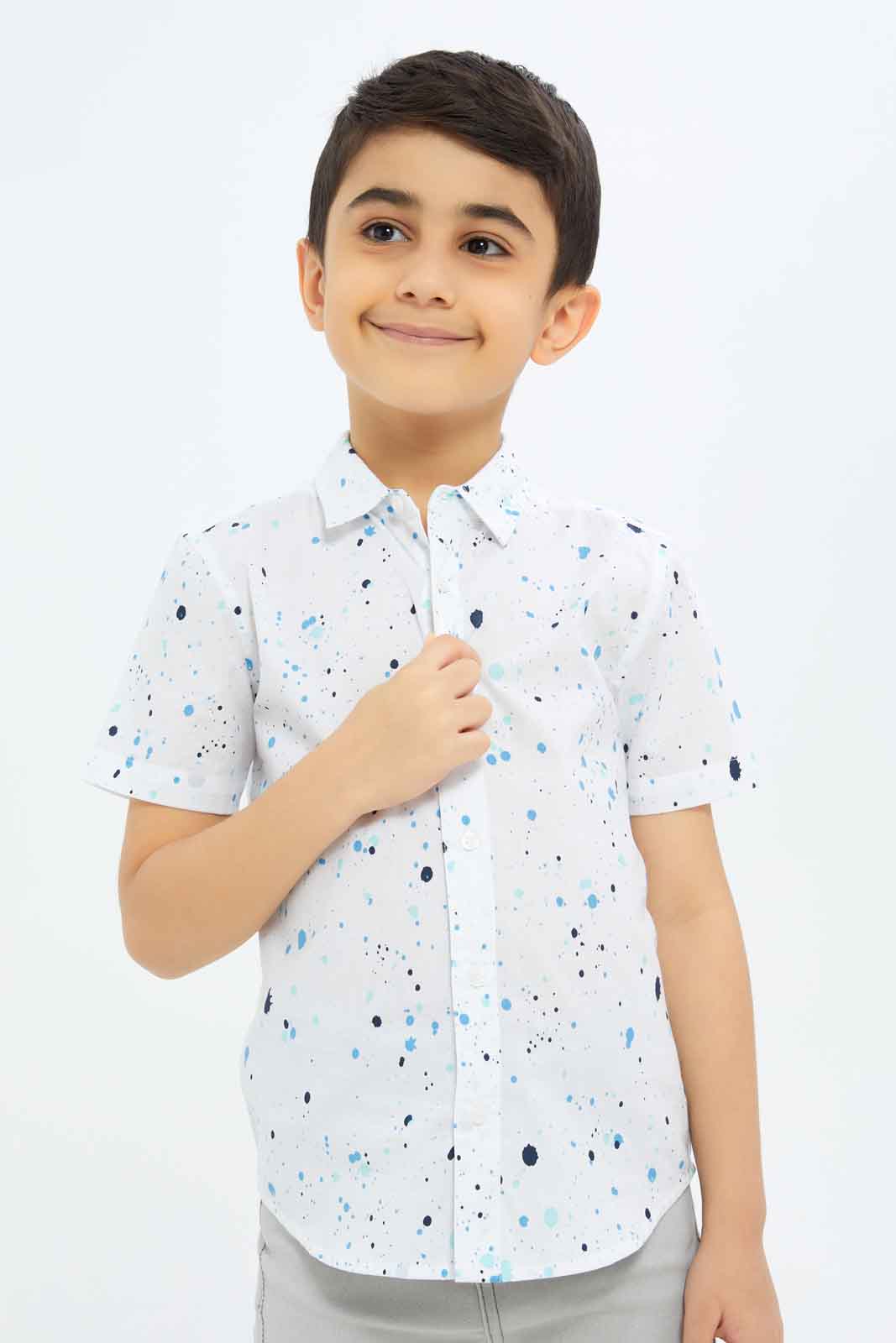 Redtag-Boys-White-Paint-Splat-Short-Sleeve-Shirt-BOY-Shirts,-Category:Shirts,-Colour:White,-Deals:New-In,-Dept:Boys,-Filter:Boys-(2-to-8-Yrs),-New-In-BOY-APL,-Non-Sale,-S23C,-Section:Boys-(0-to-14Yrs)-Boys-2 to 8 Years