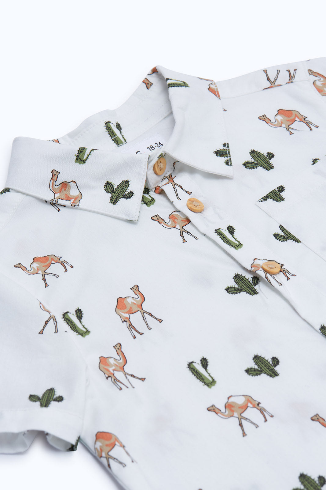 Redtag-Boys-White-Camel-Print-Woven-Shirt-And-Shorts-2-Pcs-Set-Set-Category:Sets,-Colour:White,-Deals:New-In,-Dept:Boys,-Filter:Infant-Boys-(3-to-24-Mths),-H1:KWR,-H2:INB,-H3:SET,-H4:CAE,-INB-Sets,-New-In-INB-APL,-Non-Sale,-Packs,-S23B,-Season:S23B,-Section:Boys-(0-to-14Yrs),-Set:Set-of-2-Infant-Boys-3 to 24 Months