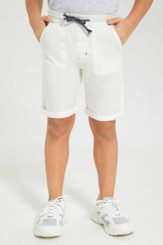 Redtag-Boys-White-Pullon-Shortds-BOY-Shorts,-Category:Shorts,-Colour:Beige,-Deals:New-In,-Dept:Boys,-Filter:Boys-(2-to-8-Yrs),-New-In-BOY-APL,-Non-Sale,-S23C,-Section:Boys-(0-to-14Yrs)-Boys-2 to 8 Years