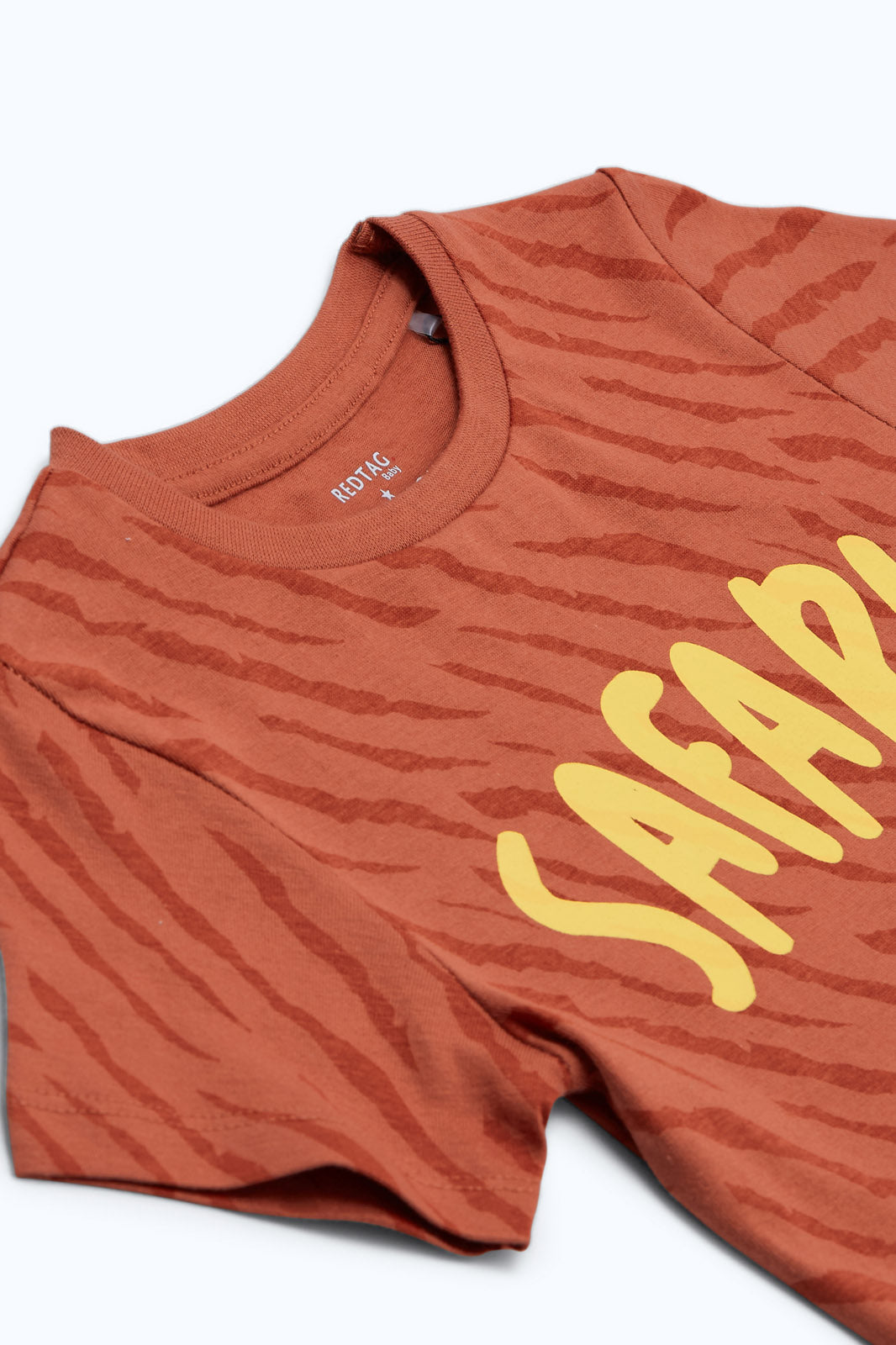 Redtag-Boys-Rust-Safari-Aop-Ss-T-Shirt-Category:T-Shirts,-Colour:Orange,-Deals:New-In,-Dept:Boys,-Filter:Infant-Boys-(3-to-24-Mths),-INB-T-Shirts,-New-In-INB-APL,-Non-Sale,-S23B,-Section:Boys-(0-to-14Yrs),-TBL-Infant-Boys-3 to 24 Months
