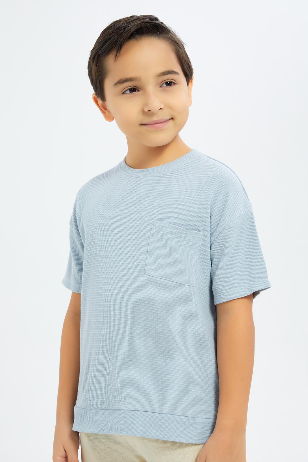 Redtag-Boys-Blue-Over-Size-Waffle-T-Shirt-BOY-T-Shirts,-Category:T-Shirts,-CHA,-Colour:Blue,-Deals:New-In,-Dept:Boys,-Filter:Boys-(2-to-8-Yrs),-New-In-BOY-APL,-Non-Sale,-S23C,-Section:Boys-(0-to-14Yrs)-Boys-2 to 8 Years