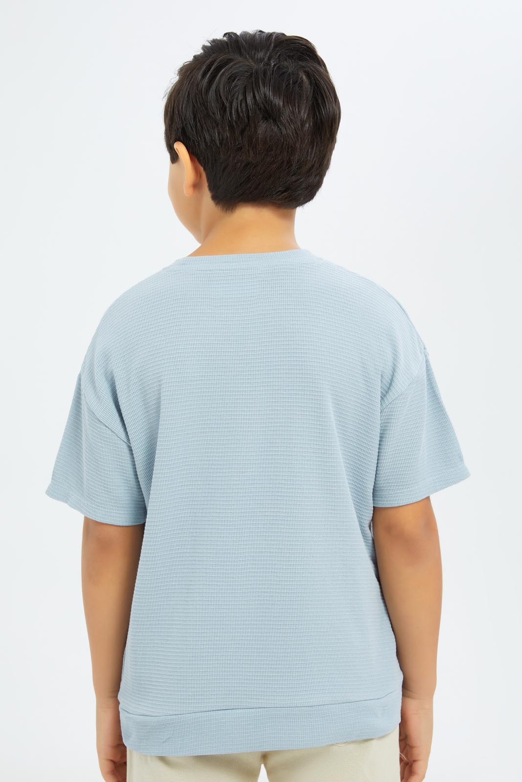 Redtag-Boys-Blue-Over-Size-Waffle-T-Shirt-BOY-T-Shirts,-Category:T-Shirts,-CHA,-Colour:Blue,-Deals:New-In,-Dept:Boys,-Filter:Boys-(2-to-8-Yrs),-New-In-BOY-APL,-Non-Sale,-S23C,-Section:Boys-(0-to-14Yrs)-Boys-2 to 8 Years
