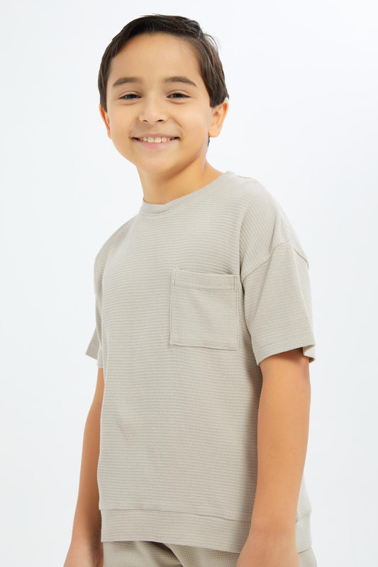 Redtag-Boys-Beige-Over-Size-Waffle-T-Shirt-BOY-T-Shirts,-Category:T-Shirts,-CHA,-Colour:Beige,-Deals:New-In,-Dept:Boys,-Filter:Boys-(2-to-8-Yrs),-New-In-BOY-APL,-Non-Sale,-S23C,-Section:Boys-(0-to-14Yrs)-Boys-2 to 8 Years