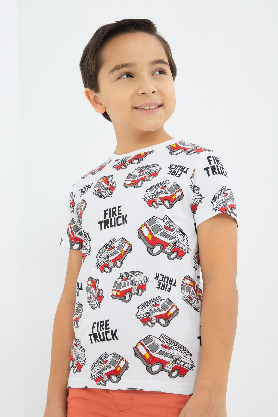 Redtag-Boys-White-Fire-Truck-Aop-T-Shirt-BOY-T-Shirts,-Category:T-Shirts,-CHA,-Colour:White,-Deals:New-In,-Dept:Boys,-Filter:Boys-(2-to-8-Yrs),-New-In-BOY-APL,-Non-Sale,-S23B,-Section:Boys-(0-to-14Yrs),-TBL-Boys-2 to 8 Years