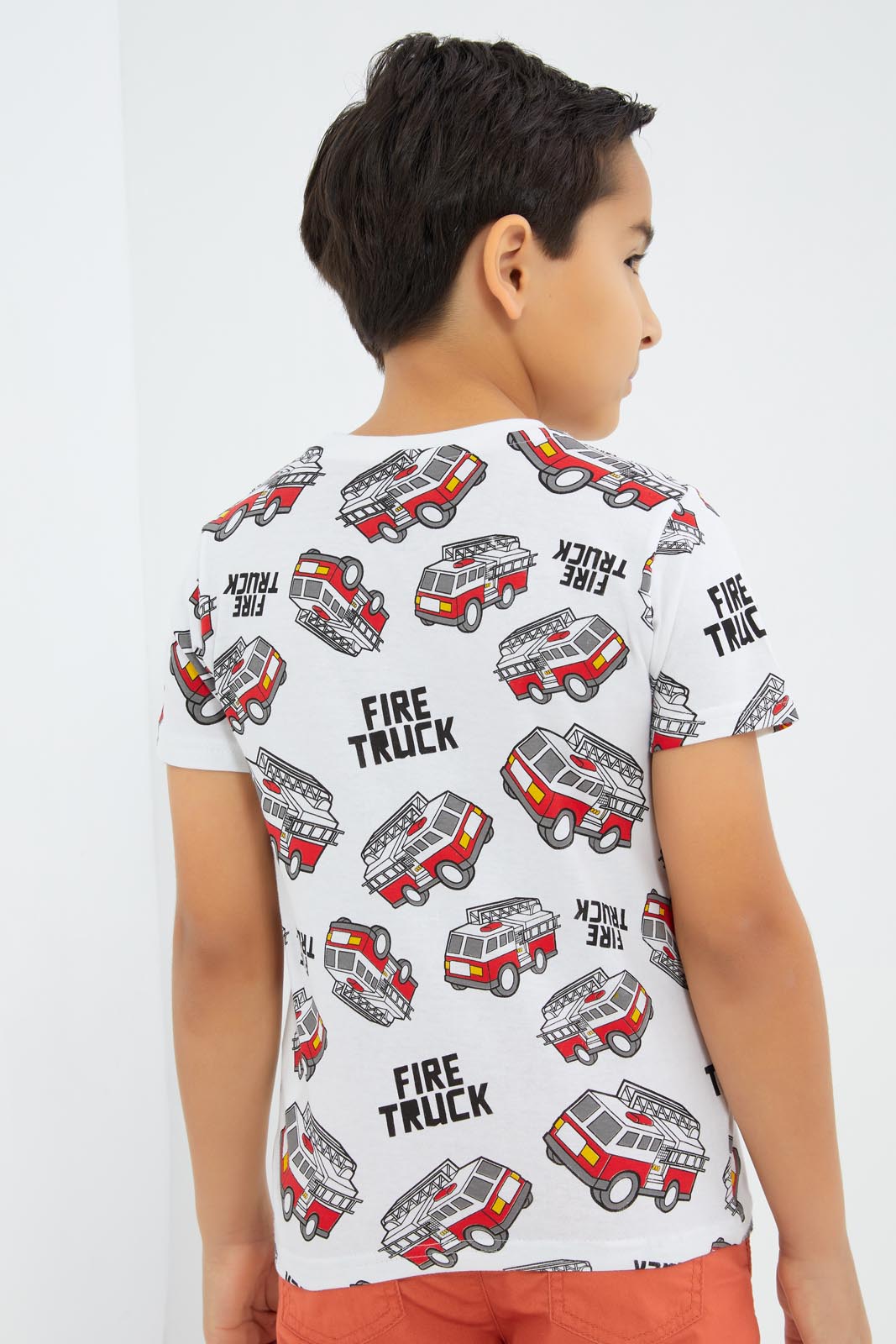 Redtag-Boys-White-Fire-Truck-Aop-T-Shirt-BOY-T-Shirts,-Category:T-Shirts,-CHA,-Colour:White,-Deals:New-In,-Dept:Boys,-Filter:Boys-(2-to-8-Yrs),-New-In-BOY-APL,-Non-Sale,-S23B,-Section:Boys-(0-to-14Yrs),-TBL-Boys-2 to 8 Years