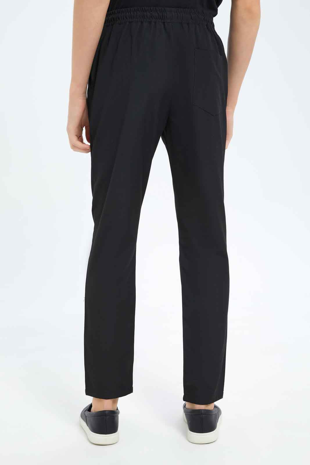 Redtag-Boys-Black-Plain-Pull-On-Casual-Trouser-BSR-Trousers,-Category:Trousers,-Colour:Black,-Deals:New-In,-Dept:Boys,-Filter:Senior-Boys-(8-to-14-Yrs),-New-In-BSR-APL,-Non-Sale,-S23B,-Section:Boys-(0-to-14Yrs)-Senior-Boys-9 to 14 Years