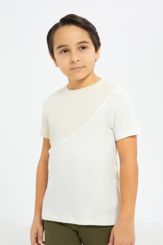 Redtag-Boys-Beige-Cut-And-Sew-Short-Sleeve-T-Shirt-BOY-T-Shirts,-Category:T-Shirts,-CHA,-Colour:Beige,-Deals:New-In,-Dept:Boys,-Filter:Boys-(2-to-8-Yrs),-H1:KWR,-H2:BOY,-H3:TSH,-H4:TSH,-New-In-BOY-APL,-Non-Sale,-RMD,-S23B,-Season:S23D,-Section:Boys-(0-to-14Yrs)-Boys-2 to 8 Years