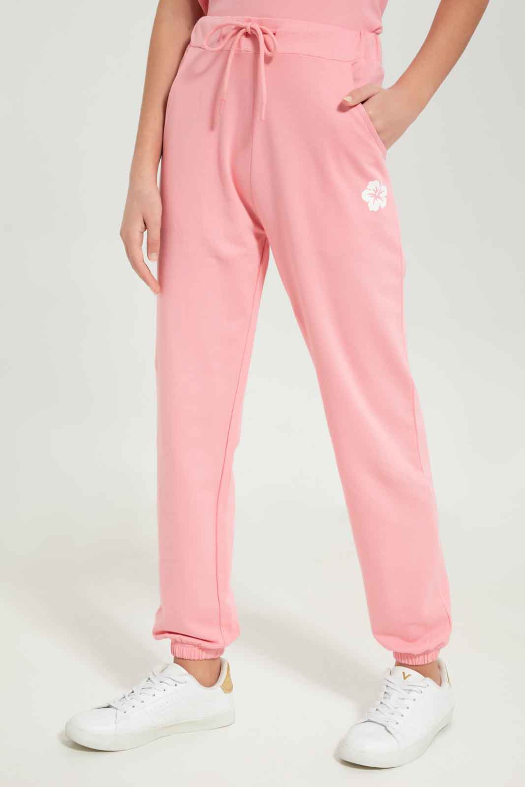 Redtag-Girls-Pink-Jogger-Category:Joggers,-Colour:Apricot,-Deals:New-In,-Dept:Girls,-Filter:Senior-Girls-(8-to-14-Yrs),-GSR-Joggers,-New-In-GSR-APL,-Non-Sale,-S23B,-Section:Girls-(0-to-14Yrs)-Senior-Girls-9 to 14 Years