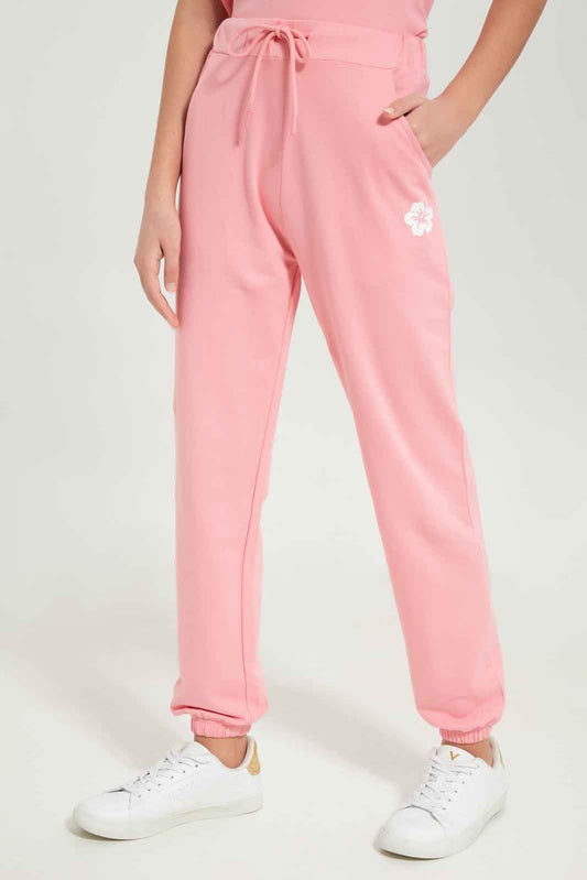 Redtag-Girls-Pink-Jogger-Category:Joggers,-Colour:Apricot,-Deals:New-In,-Dept:Girls,-Filter:Senior-Girls-(8-to-14-Yrs),-GSR-Joggers,-New-In-GSR-APL,-Non-Sale,-S23B,-Section:Girls-(0-to-14Yrs)-Senior-Girls-9 to 14 Years