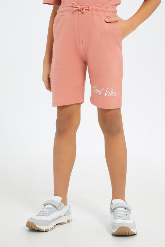Redtag-Boys-Pale-Pink-Pique-Shorts-BOY-Shorts,-Category:Shorts,-Colour:Apricot,-Deals:New-In,-Dept:Boys,-Filter:Boys-(2-to-8-Yrs),-New-In-BOY-APL,-Non-Sale,-S23B,-Section:Boys-(0-to-14Yrs),-TBL-Boys-2 to 8 Years