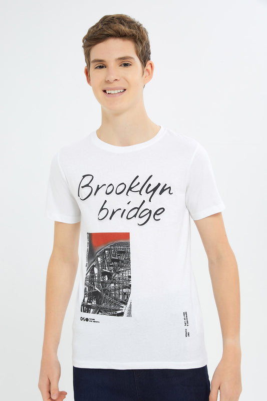 Redtag-Boys-White-Emboss-Tee-BSR-T-Shirts,-Category:T-Shirts,-Colour:White,-Deals:New-In,-Dept:Boys,-Filter:Senior-Boys-(8-to-14-Yrs),-H1:KWR,-H2:BSR,-H3:TSH,-H4:TSH,-New-In-BSR-APL,-Non-Sale,-S23B,-Season:S23C,-Section:Boys-(0-to-14Yrs)-Senior-Boys-9 to 14 Years