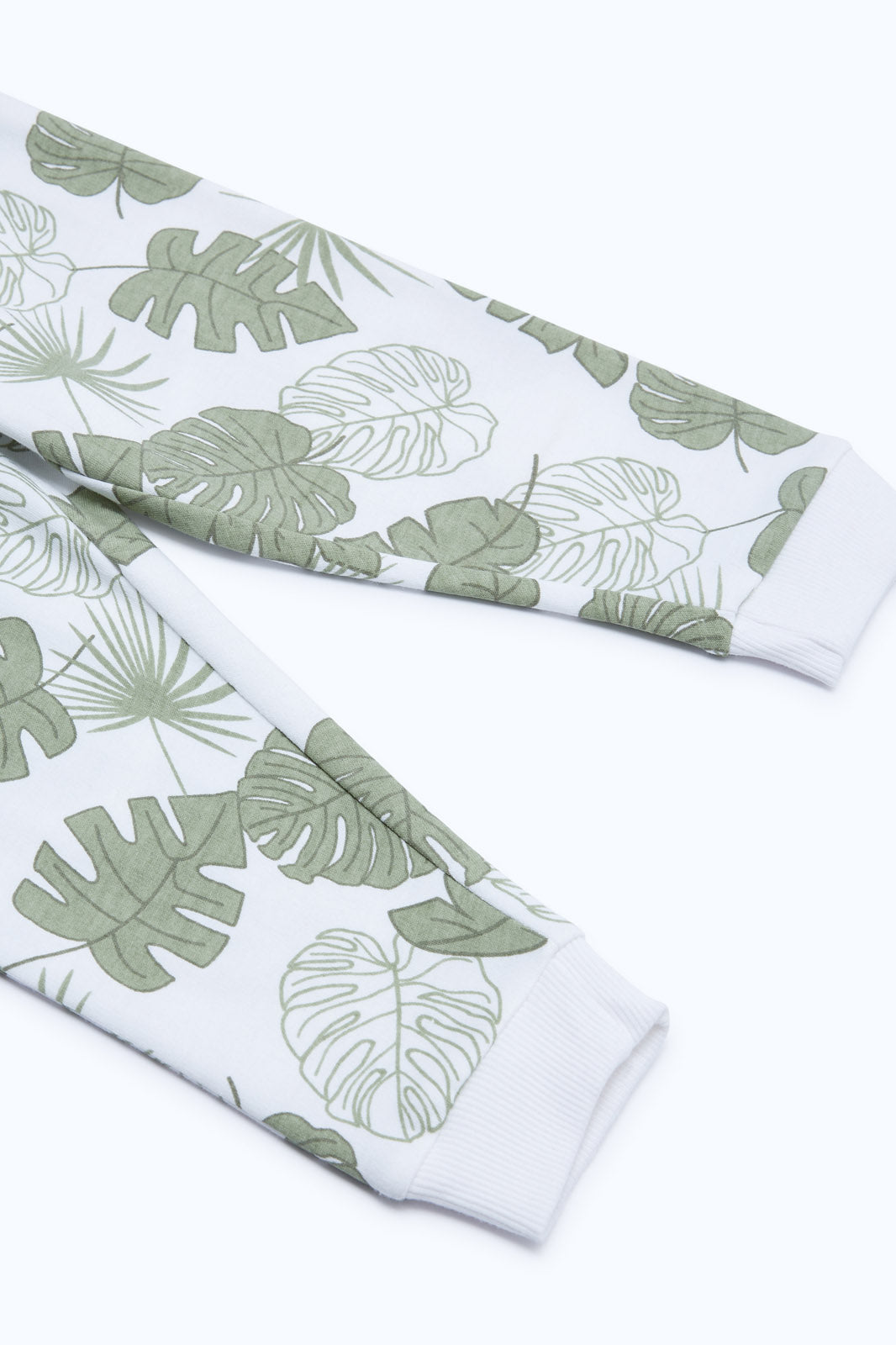 Redtag-Boys-White-Aop-Leaf-Knit-Jogger-Category:Joggers,-Colour:White,-Deals:2-FOR-37,-Deals:New-In,-Dept:Boys,-Filter:Infant-Boys-(3-to-24-Mths),-H1:KWR,-H2:INB,-H3:SPW,-H4:ATP,-INB-Joggers,-New-In-INB-APL,-Non-Sale,-S23B,-Season:S23B,-Section:Boys-(0-to-14Yrs),-TBL-Infant-Boys-3 to 24 Months