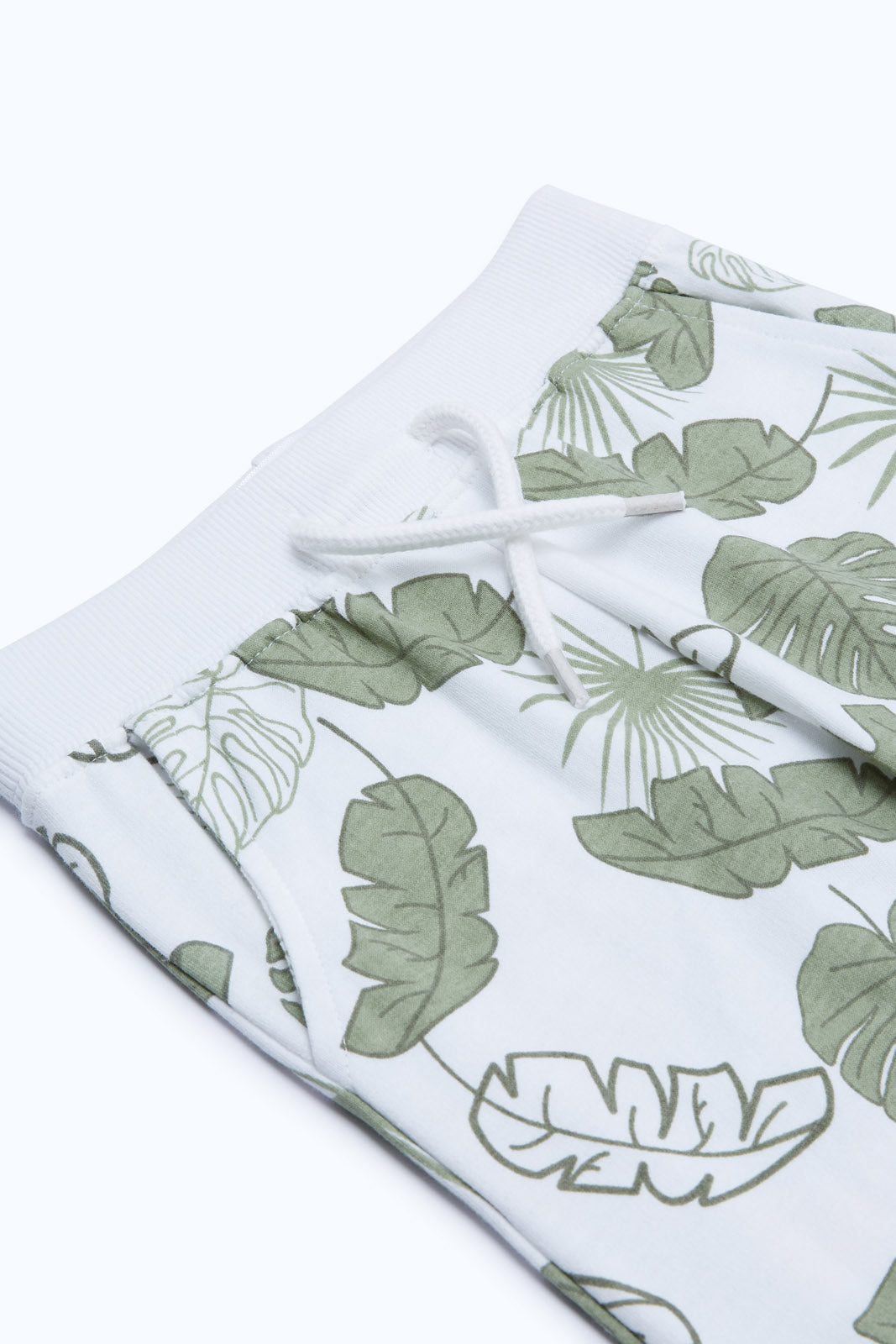 Redtag-Boys-White-Aop-Leaf-Knit-Jogger-Category:Joggers,-Colour:White,-Deals:2-FOR-37,-Deals:New-In,-Dept:Boys,-Filter:Infant-Boys-(3-to-24-Mths),-H1:KWR,-H2:INB,-H3:SPW,-H4:ATP,-INB-Joggers,-New-In-INB-APL,-Non-Sale,-S23B,-Season:S23B,-Section:Boys-(0-to-14Yrs),-TBL-Infant-Boys-3 to 24 Months