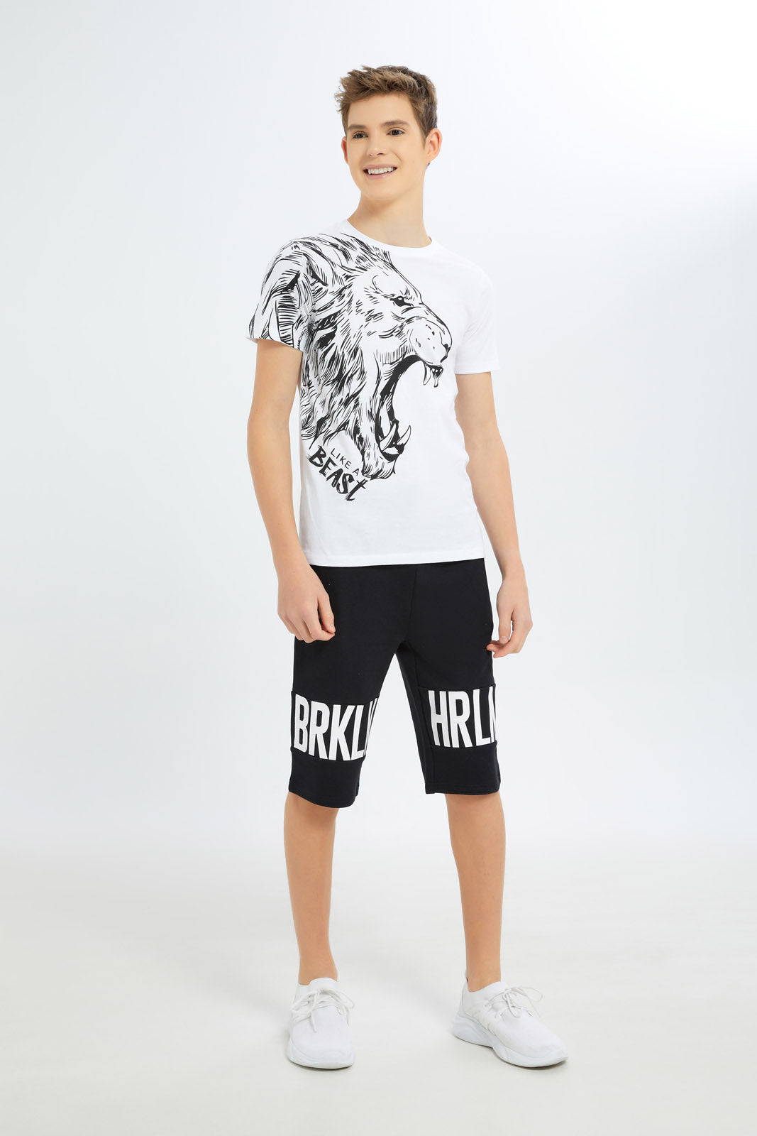 Redtag-Boys-White-Lion-Roaring-Tee-BSR-T-Shirts,-Category:T-Shirts,-Colour:White,-Deals:New-In,-Dept:Boys,-Filter:Senior-Boys-(8-to-14-Yrs),-H1:KWR,-H2:BSR,-H3:TSH,-H4:TSH,-New-In-BSR-APL,-Non-Sale,-S23B,-Season:S23B,-Section:Boys-(0-to-14Yrs)-Senior-Boys-9 to 14 Years