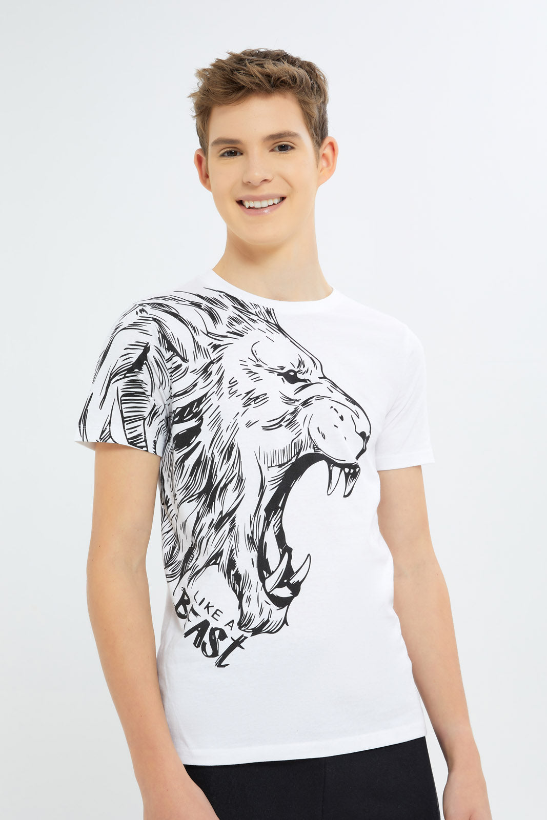 Redtag-Boys-White-Lion-Roaring-Tee-BSR-T-Shirts,-Category:T-Shirts,-Colour:White,-Deals:New-In,-Dept:Boys,-Filter:Senior-Boys-(8-to-14-Yrs),-H1:KWR,-H2:BSR,-H3:TSH,-H4:TSH,-New-In-BSR-APL,-Non-Sale,-S23B,-Season:S23B,-Section:Boys-(0-to-14Yrs)-Senior-Boys-9 to 14 Years