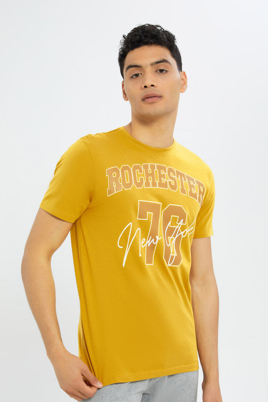 Redtag-Men-Mustard-Graphic-T-Shirt-Category:T-Shirts,-Colour:Mustard,-Deals:New-In,-Dept:Menswear,-Filter:Men's-Clothing,-H1:MWR,-H2:GEN,-H3:TSH,-H4:TSH,-Men-T-Shirts,-New-In-Men-APL,-Non-Sale,-S23C,-Season:S23C,-Section:Men,-TBL-Men's-